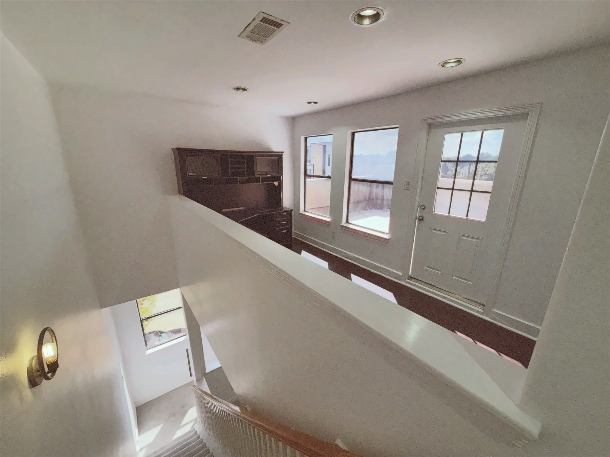 Fourth floor landing area that could be a place for entertaining guest or office.