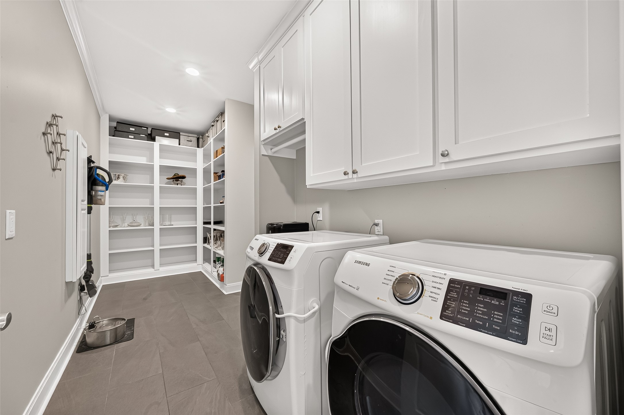Large laundry room and pantry space - right off the kitchen.