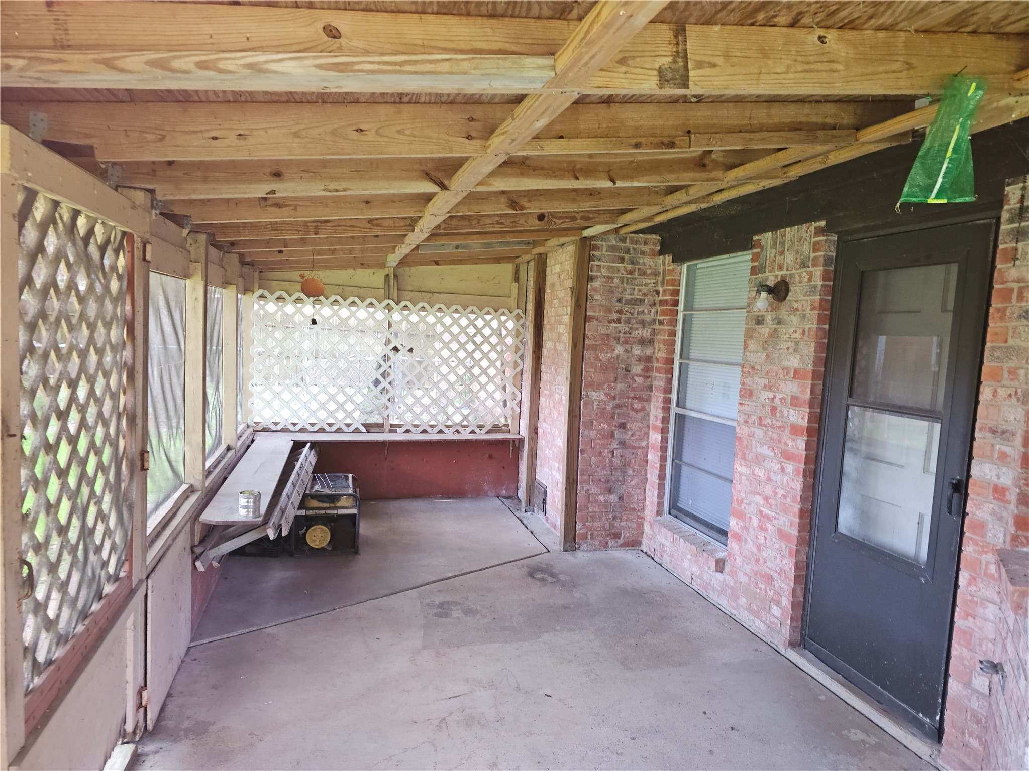 Large screened porch provides a shaded retreat for morning coffee, evening gatherings, or simply unwinding outdoors.