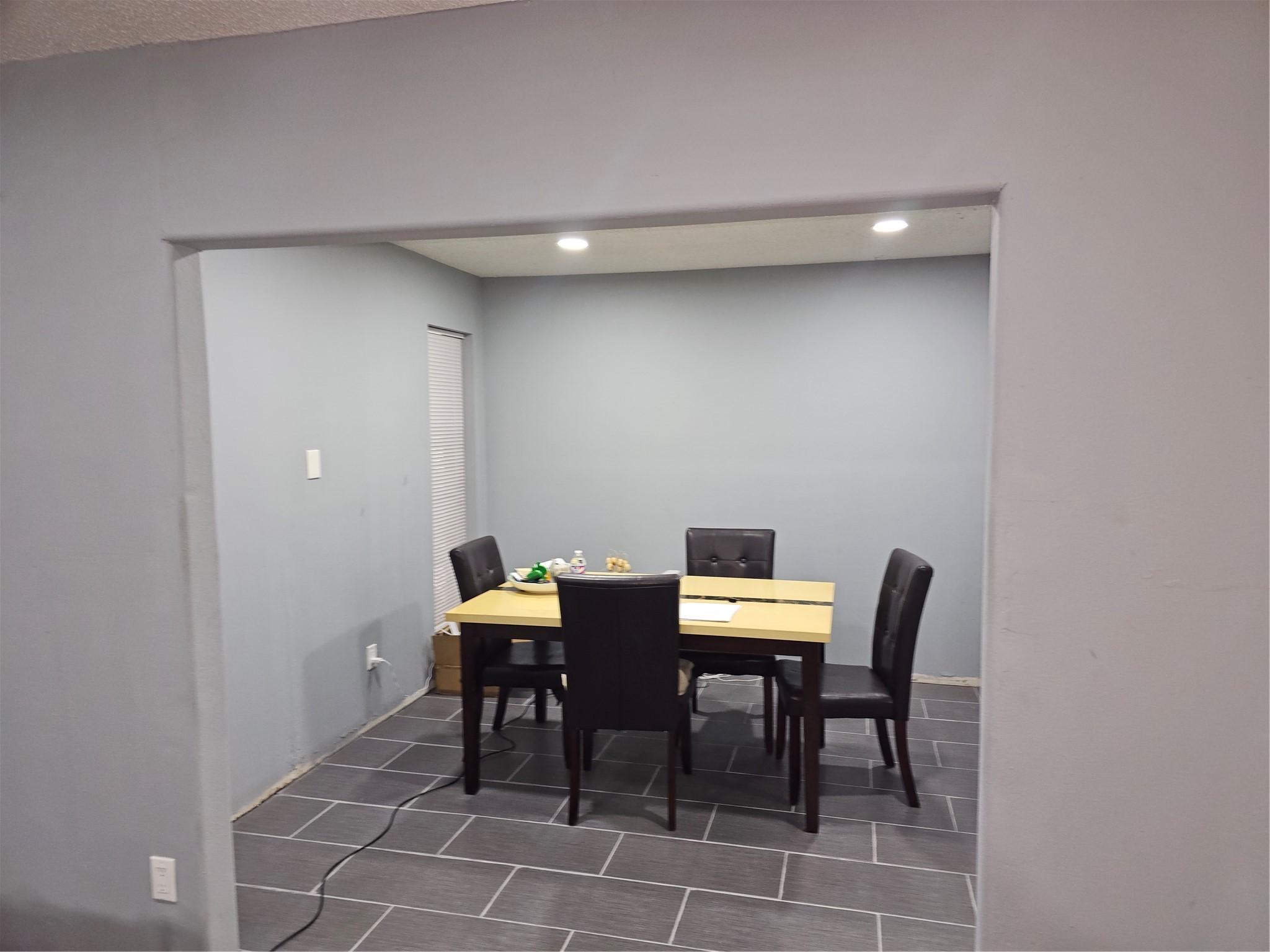 Generous dining room is ideal for hosting family and friends while remaining connected to the home's main living spaces.