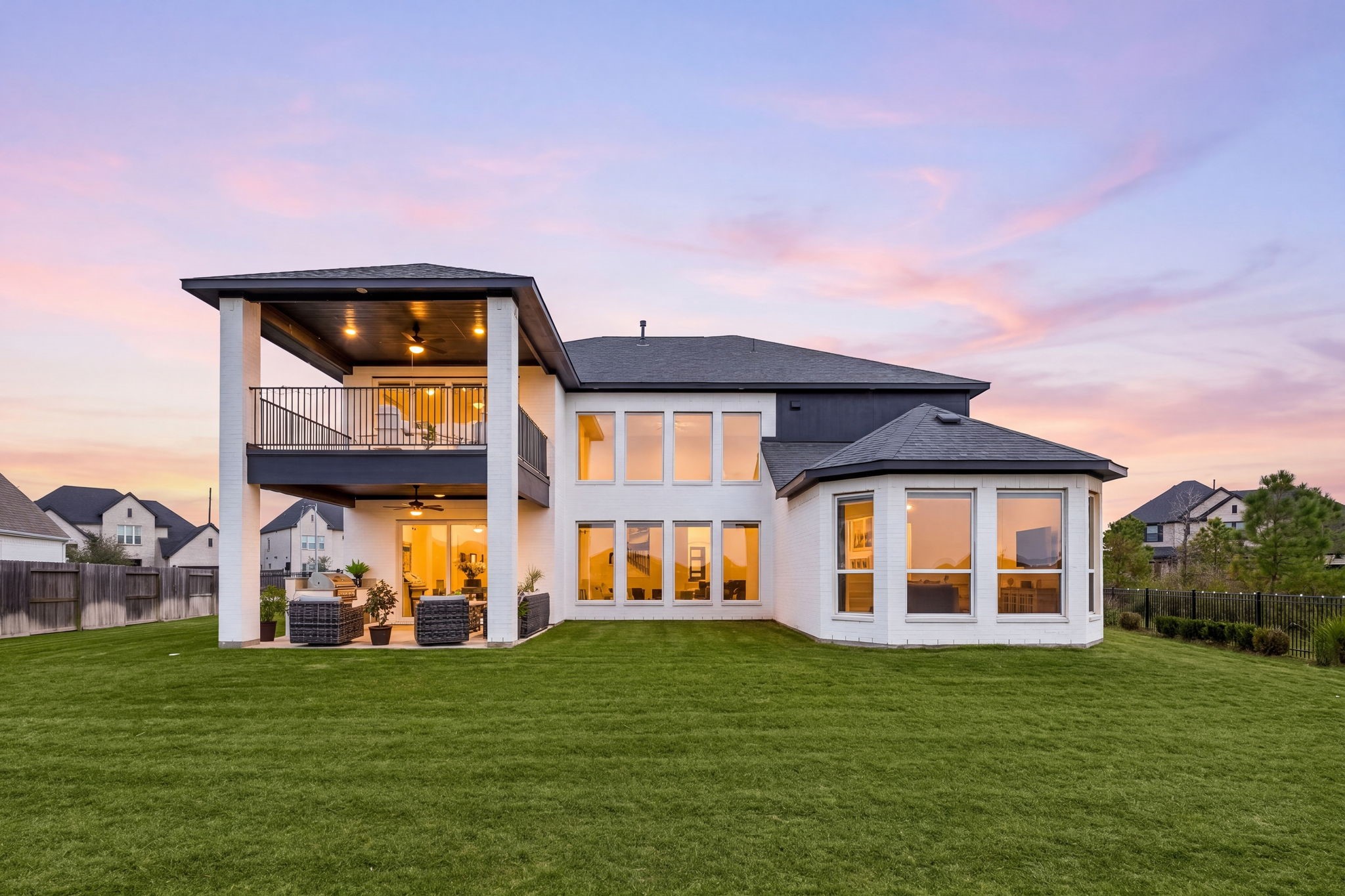 Where luxury meets tranquility. Enjoy breathtaking lake views, the warm glow of the fire pit, and an enchanting twilight ambiance in this elevated outdoor sanctuary.