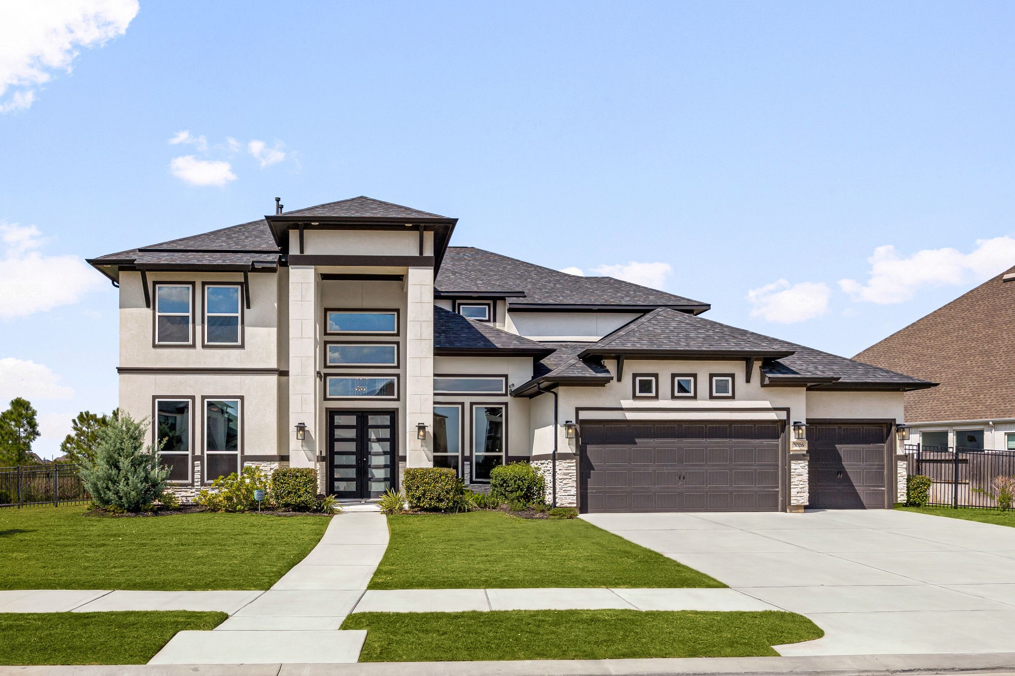 Timeless architecture meets elevated luxury in this exceptional J. Patrick Homes residence, where striking curb appeal and refined craftsmanship make an unforgettable first impression.