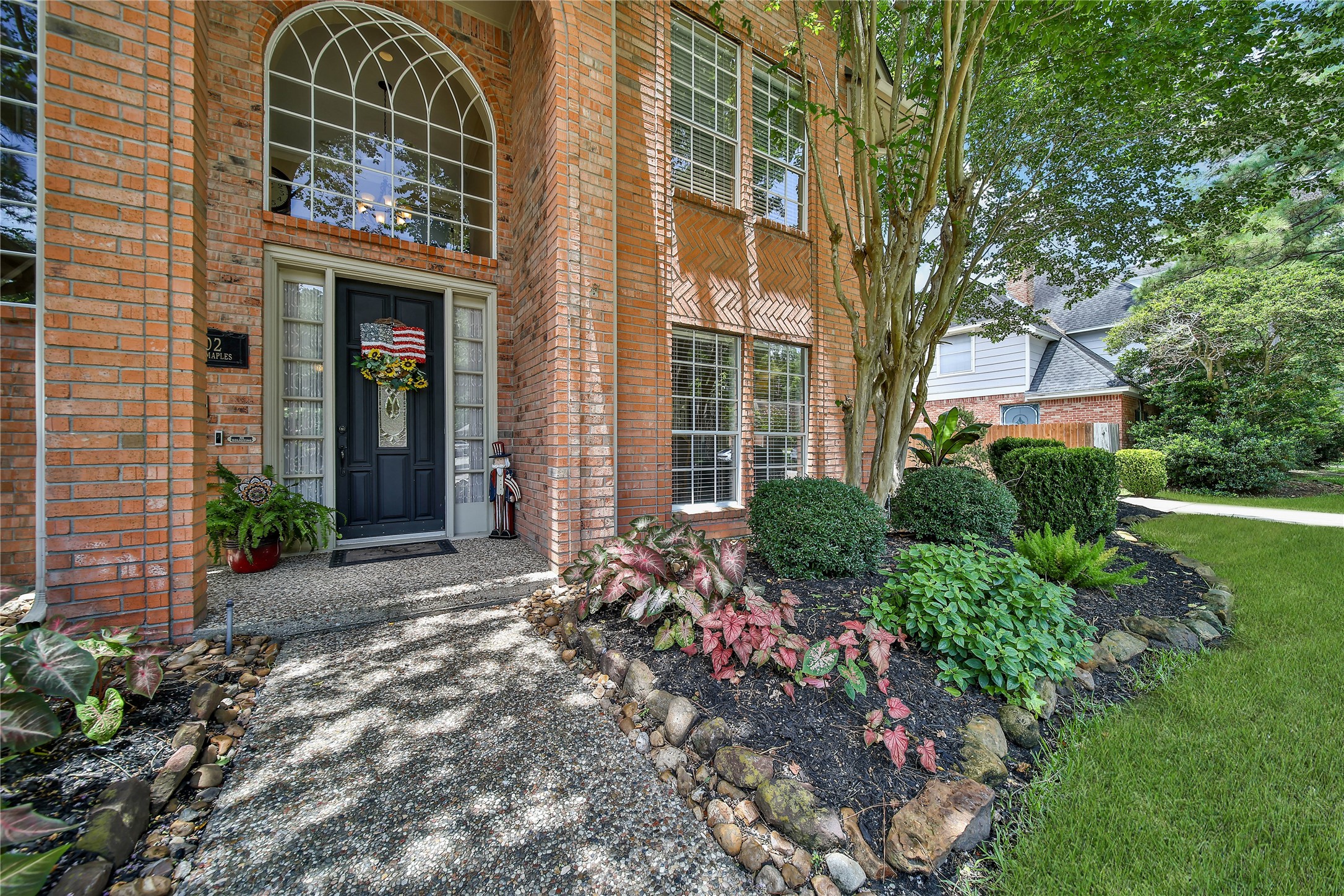 Pool + covered patio + second covered outdoor area + oversized porte-cochere + breakfast room overlooking the backyard + multiple downstairs living spaces.