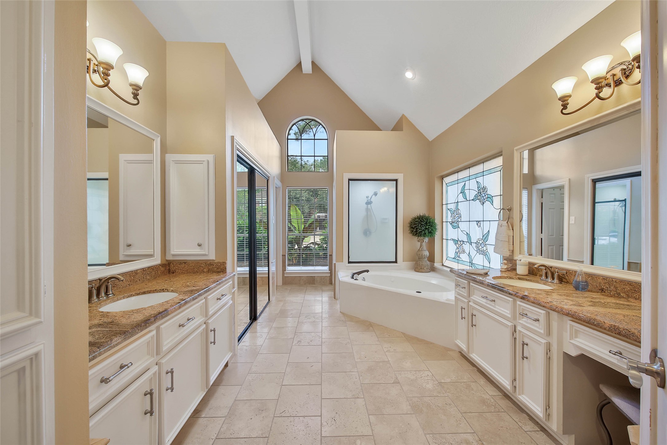 Private primary suite with adjoining bath and walk-in storageall on the main level.
