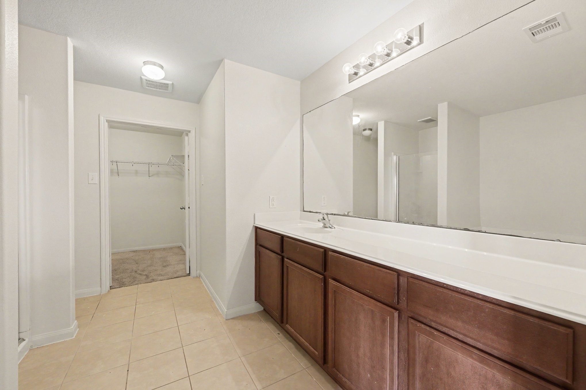 Spacious Primary Bathroom with seperate stand-alone shower
