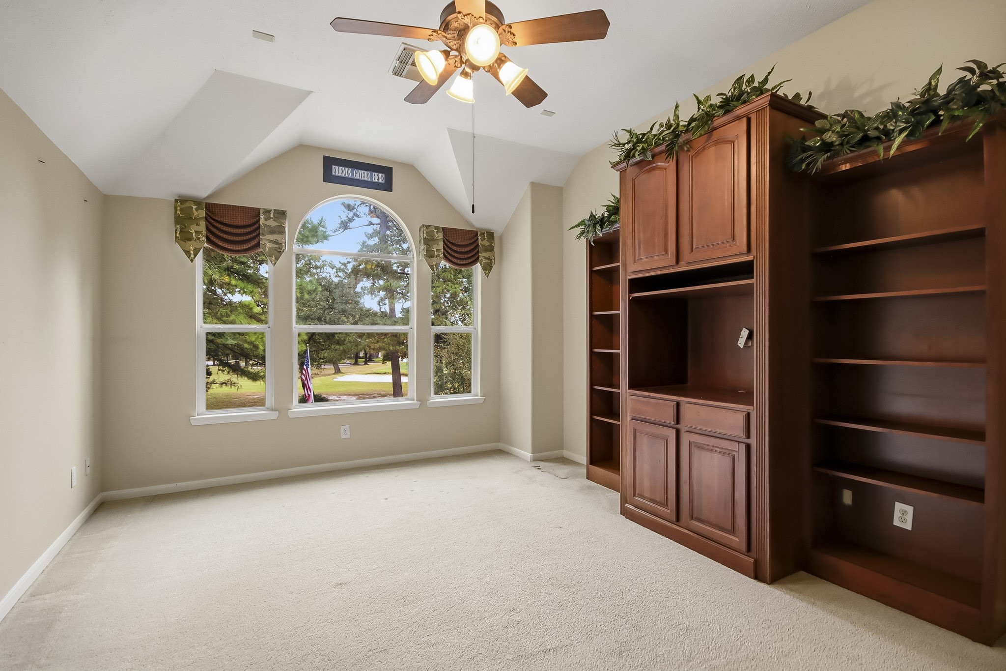 Spacious second-floor game room featuring beautiful views overlooking the sparkling pool and lush golf course, perfect for entertaining, relaxing, and enjoying time with family and friends!