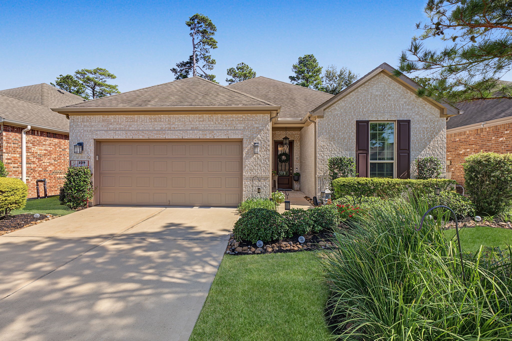 Full gutters all the way around, an updated irrigation system (Rain Bird), and established landscaping.