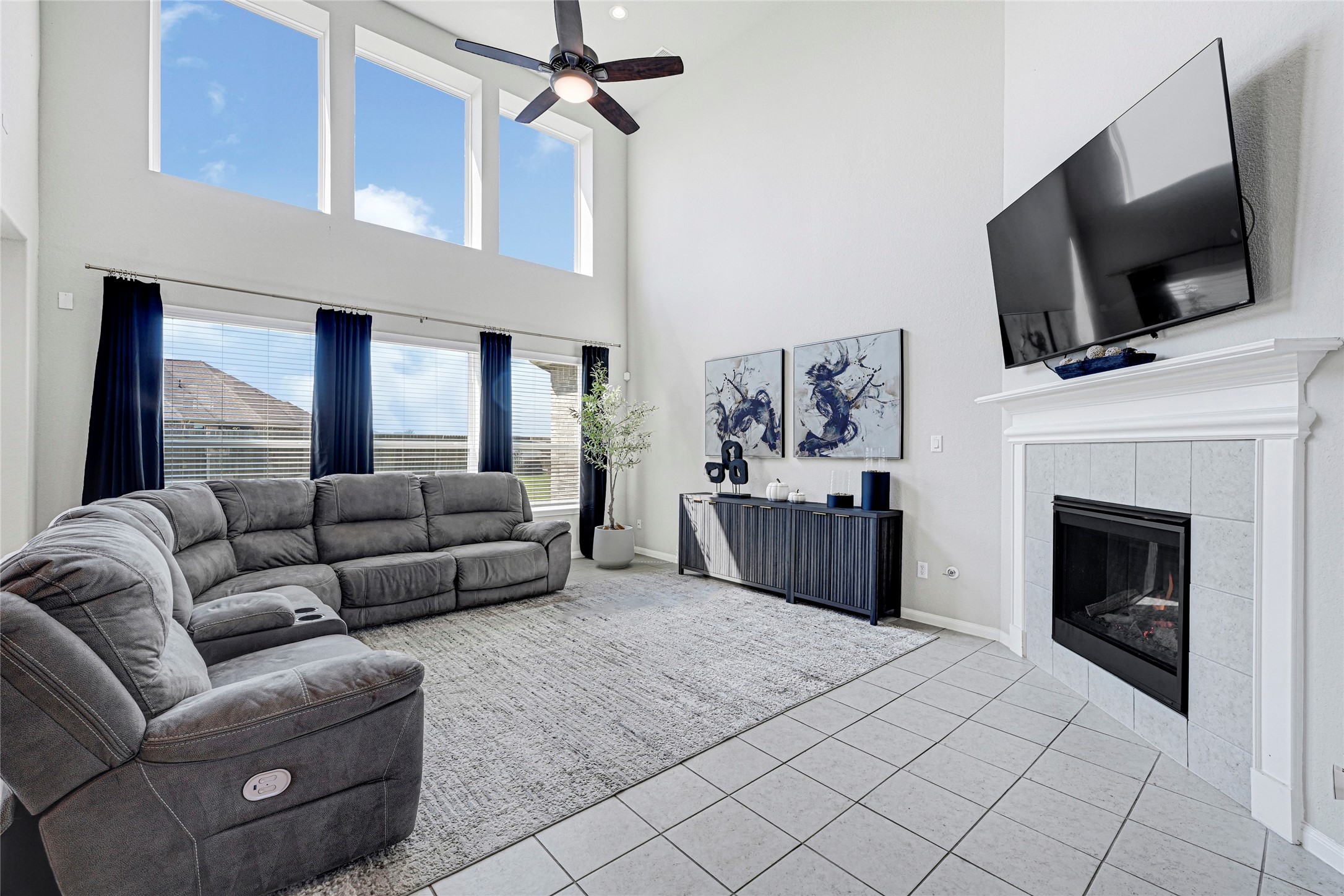 Grand & Light-filled Family Room with Gas Fireplace. Grand & Light-filled Family Room with Gas Fireplace.