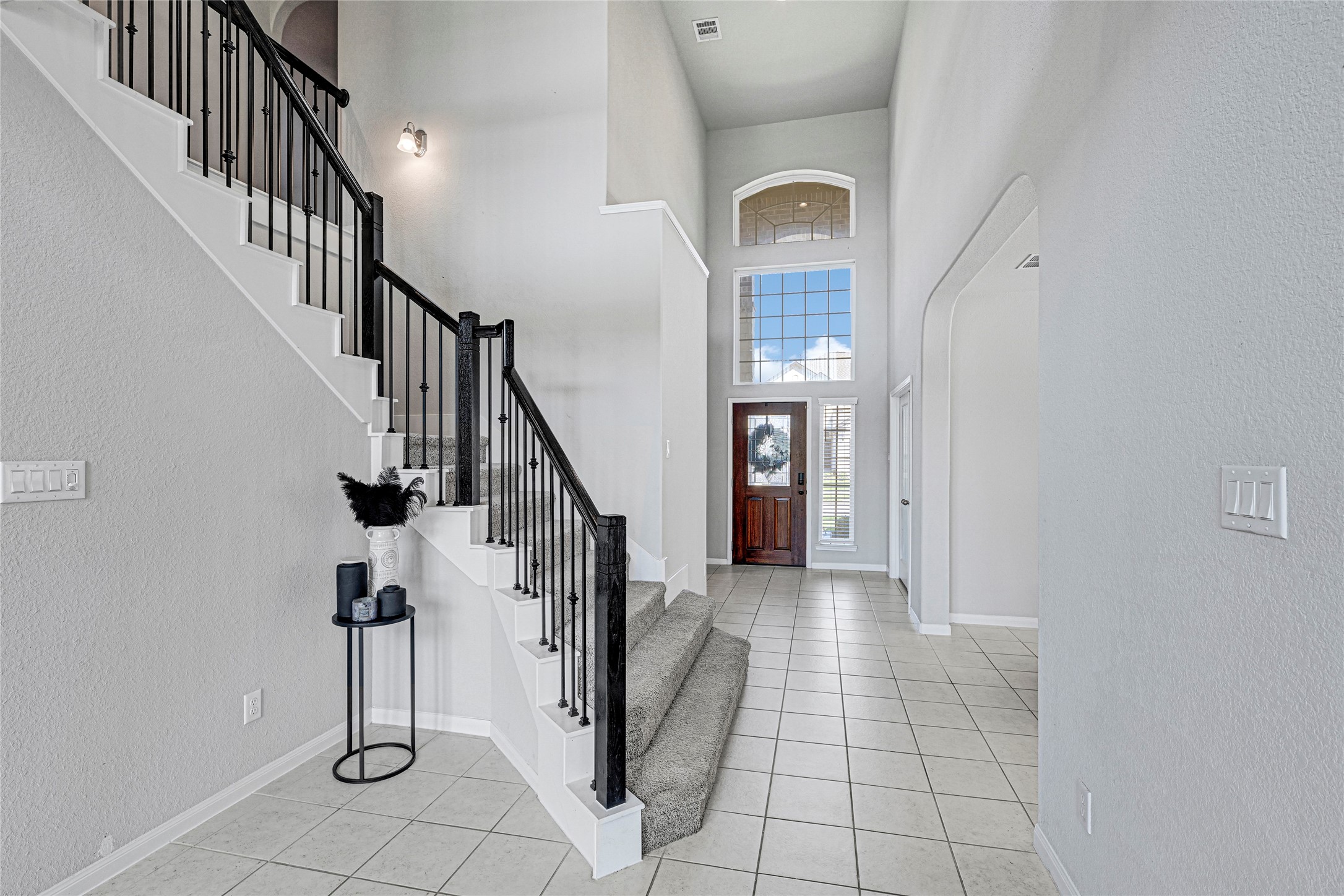 Grand Staircase with Wrought Iron Railings. Grand Staircase with Wrought Iron Railings.