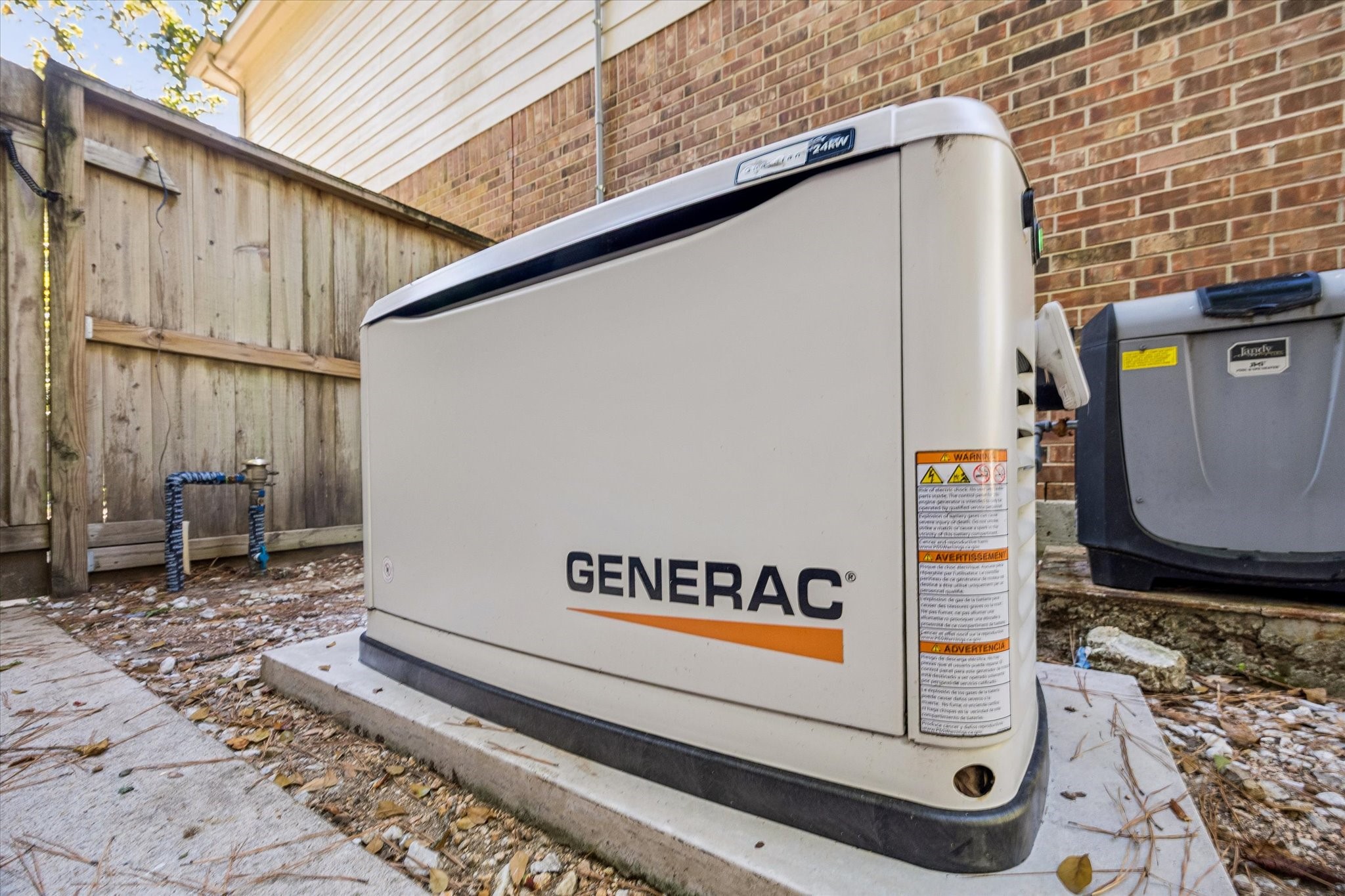The home is equipped with a Generac whole-home generator, providing added peace of mind during unexpected power outages.