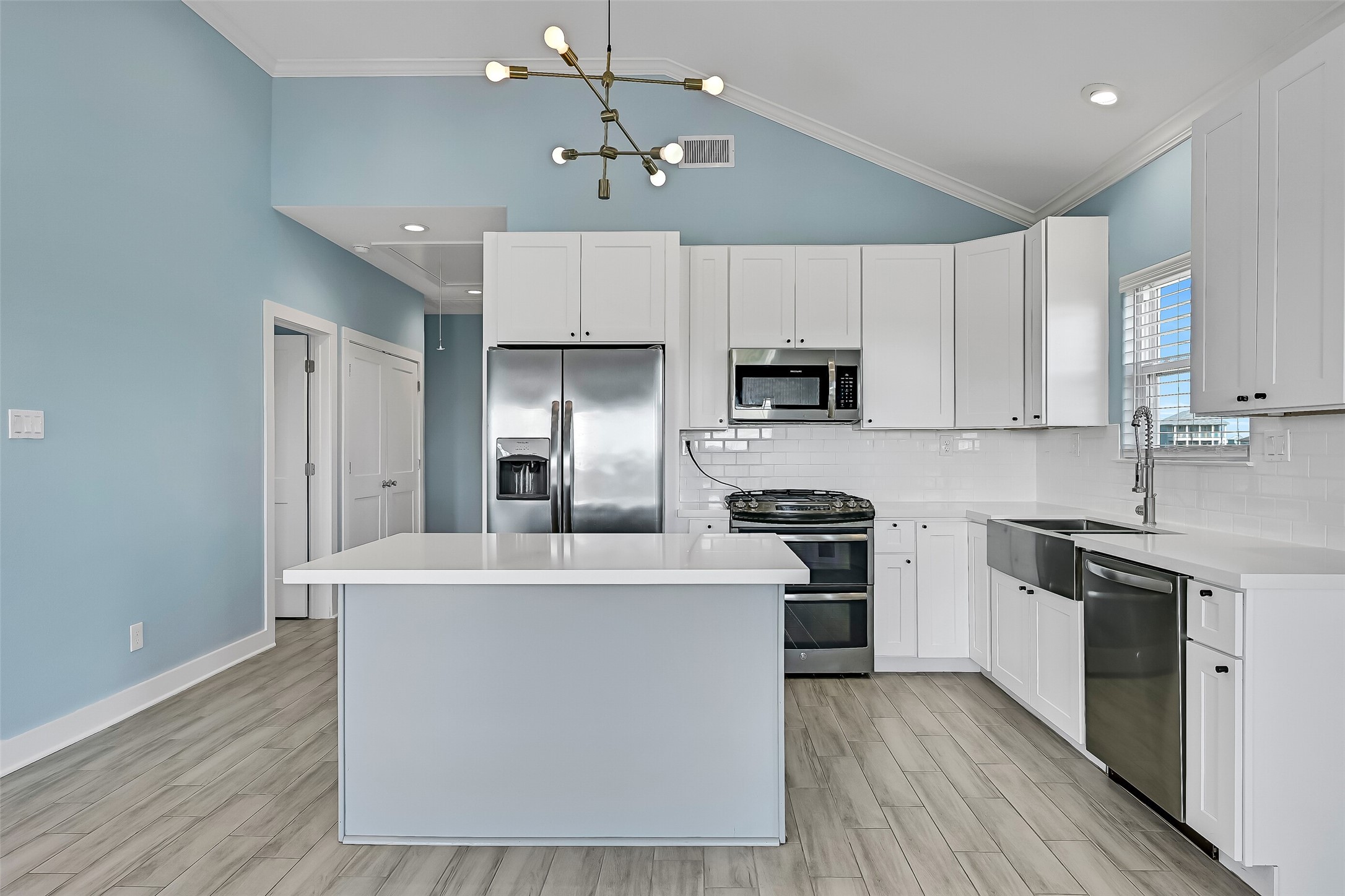 The kitchen island offers breakfast bar seating for two.