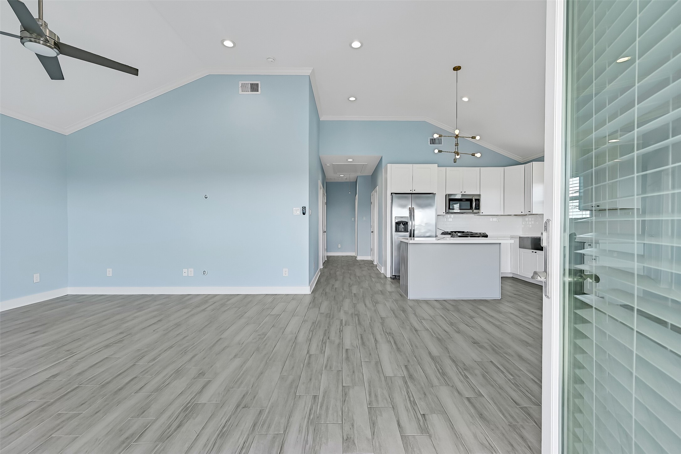 As you set inside you will be welcomed into living room filled with natural light.