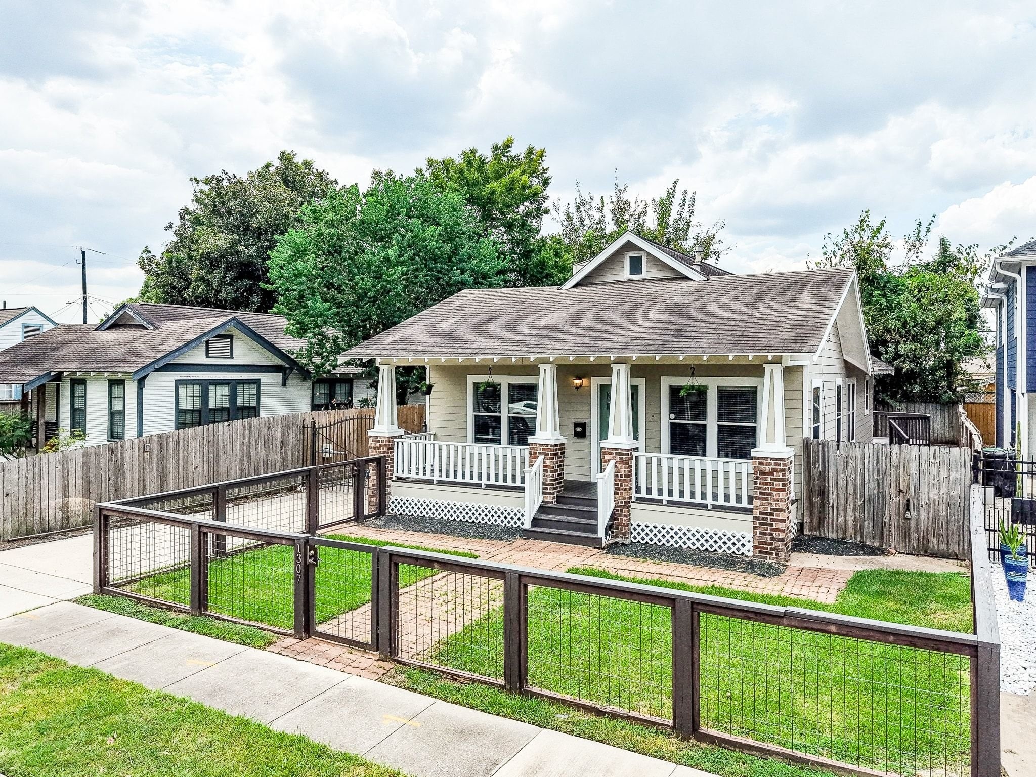 Fenced front yard offering added privacy and curb app Fenced front yard offering added privacy and curb app