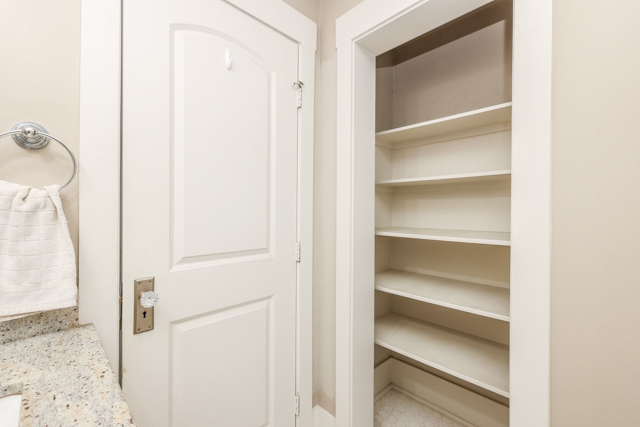 Built-in closet with ample shelving.