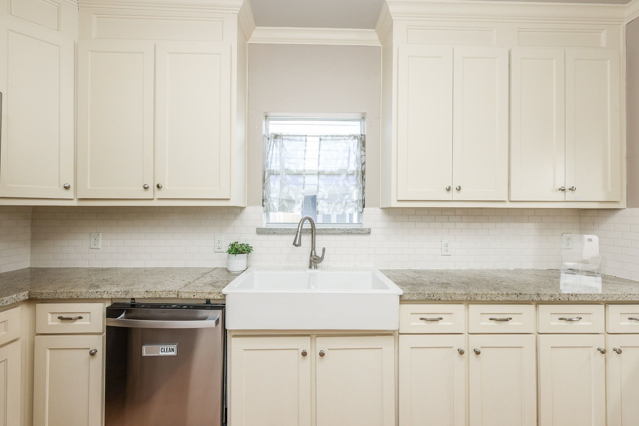 Stainless steel appliances and apron sink. Stainless steel appliances and apron sink.