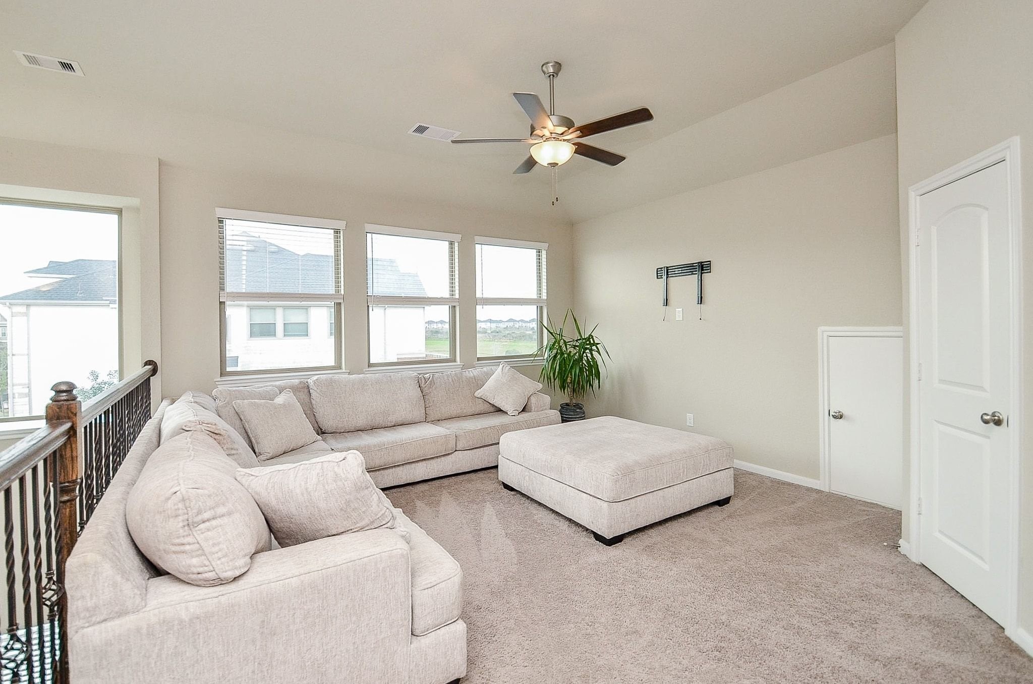 This open space on the second floor can function for multiple uses