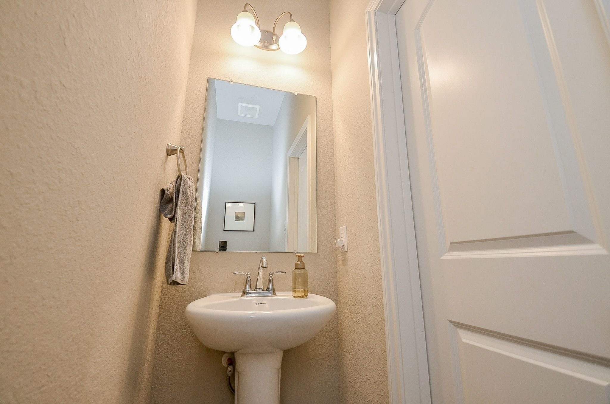 On the first floor there is a half bathroom for guests