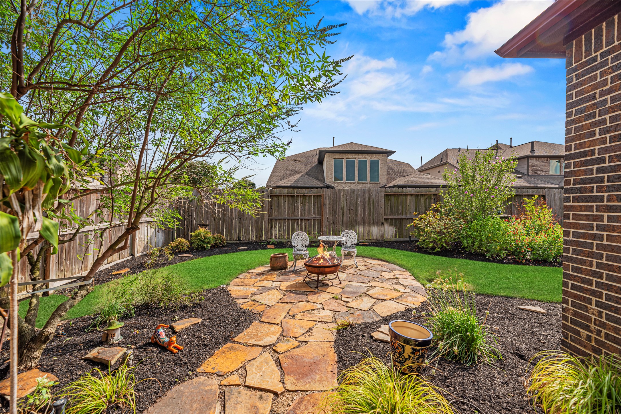 Another view of the charming backyard retreat.