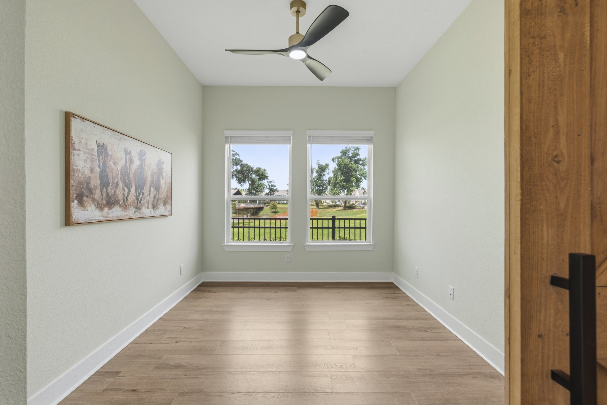 The Study is bathed in natural light, thanks to a pair of windows that overlook the huge open space Reserve and tranquil Sheffield Lake. Bright, airy, and inviting, this thoughtfully designed space provides the perfect setting for work and inspiration.