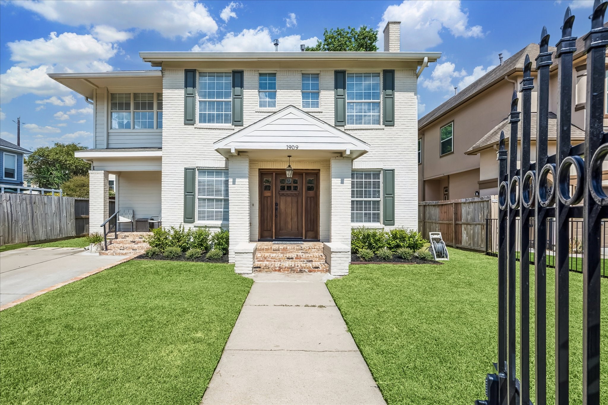 Classic two-story architecture is complemented by roofing improvements and gutters completed in 2020, all just minutes from Hermann Park and the Texas Medical Center.