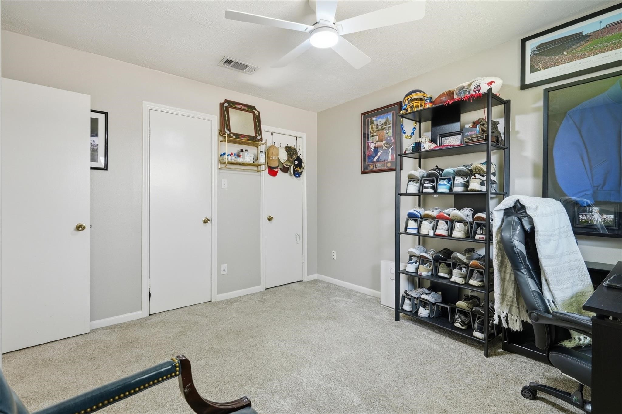 2 closets can be found in this bedroom