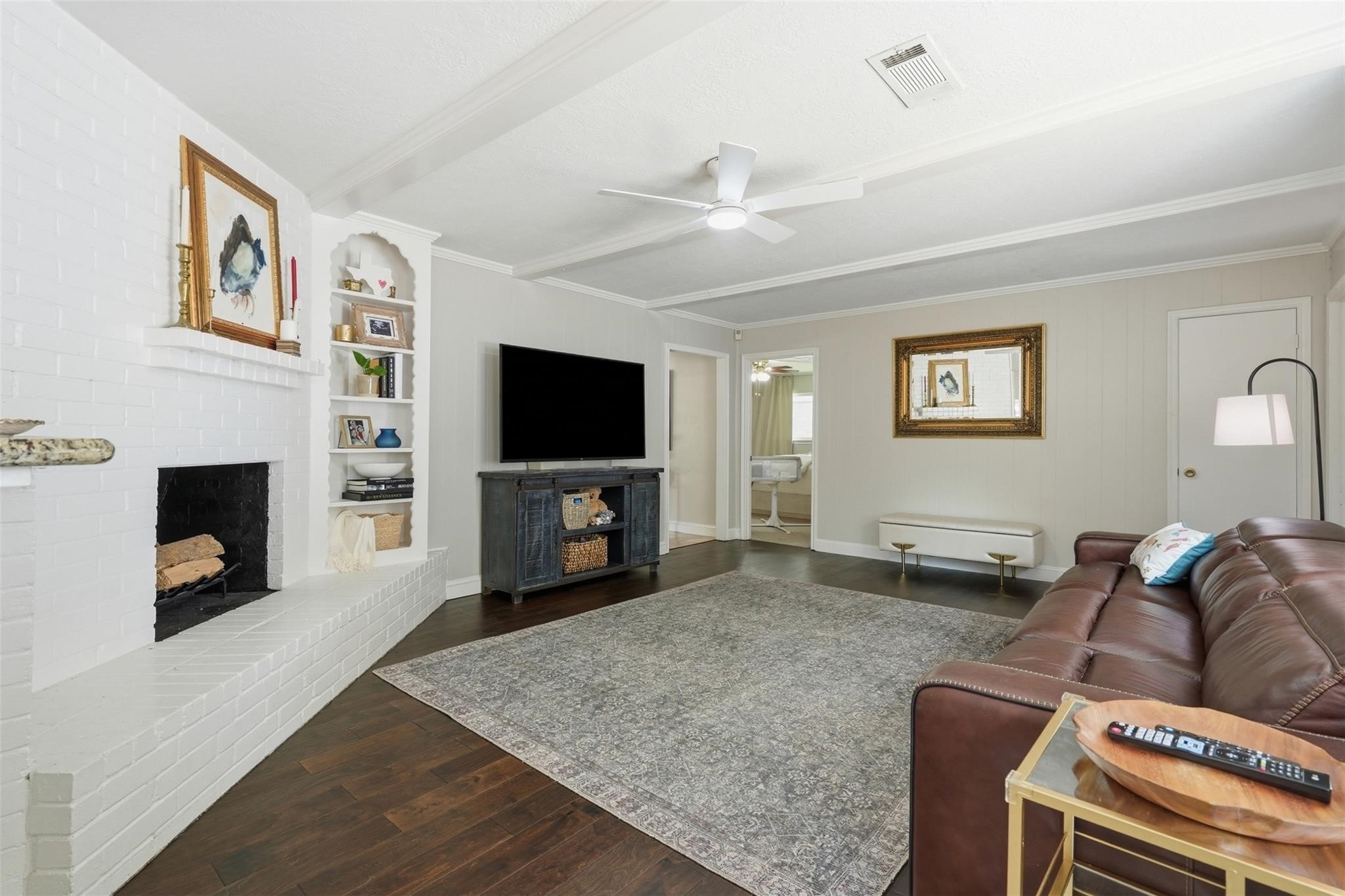 Just off the main living space, you will find the primary suite, along with a private en-suite bath.