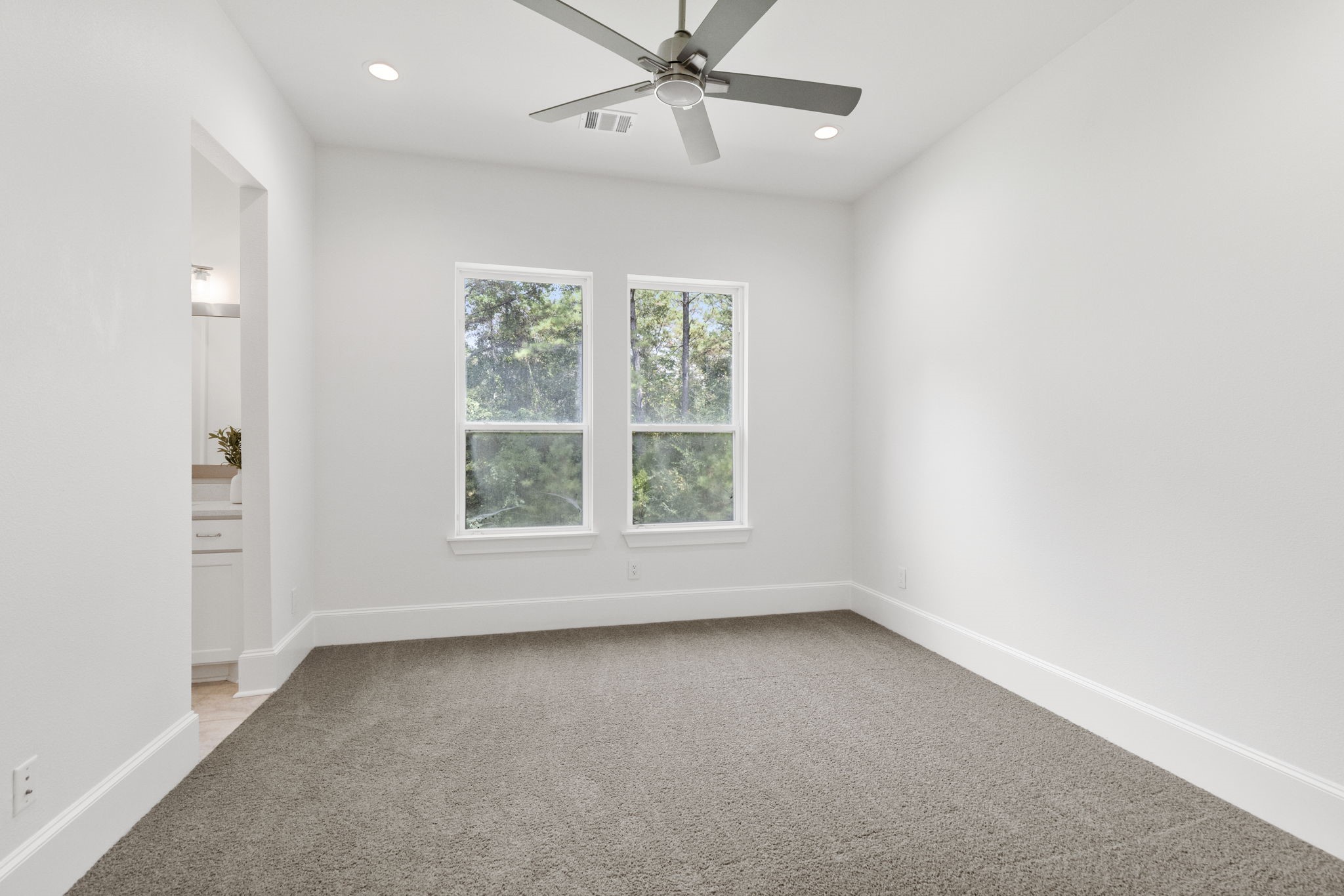 Bedroom two has great windows and a ensuite bath for convenience.