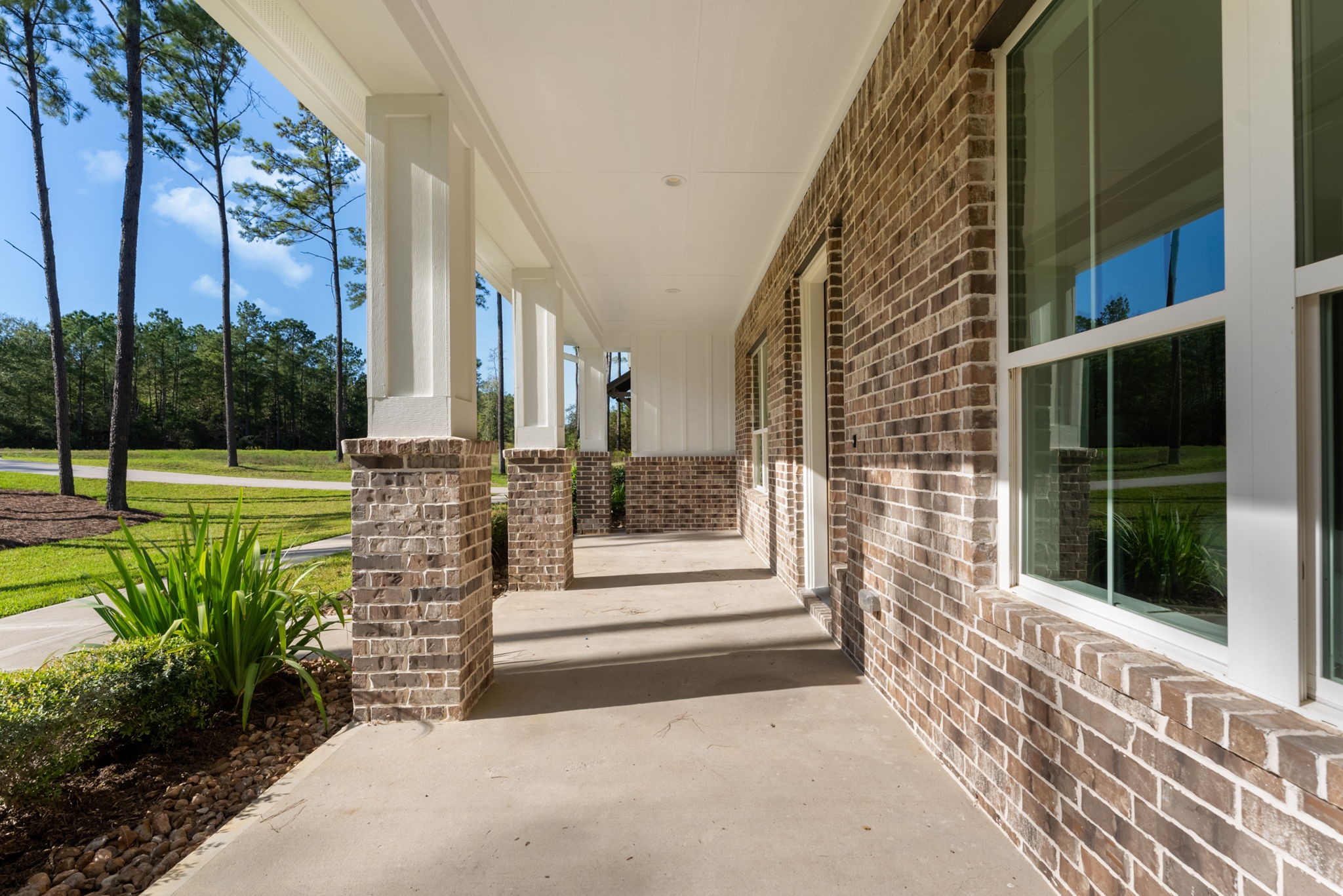 This expansive front porch adds a warm, welcoming charm to the home, perfect for relaxing while overlooking the gorgeous yard. This expansive front porch adds a warm, welcoming charm to the home, perfect for relaxing while overlooking the gorgeous yard.