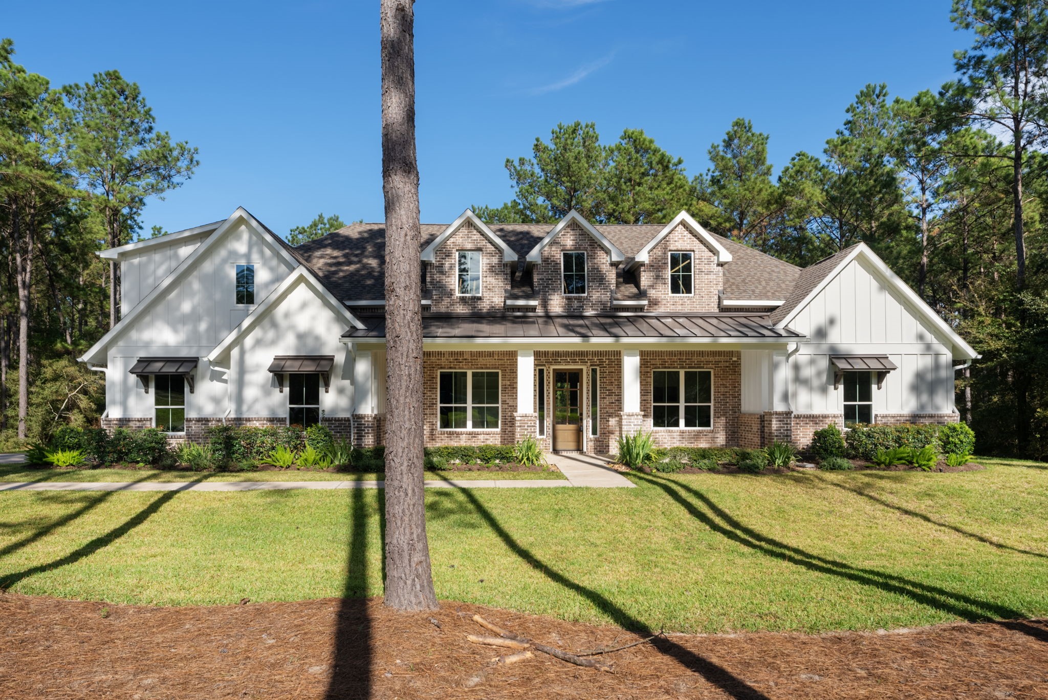 Incredible opportunity to own a custom home expertly crafted by award-winning Royal Texan Homes, situated on 1.9 wooded acres in the sought-after Republic Grand Ranch.