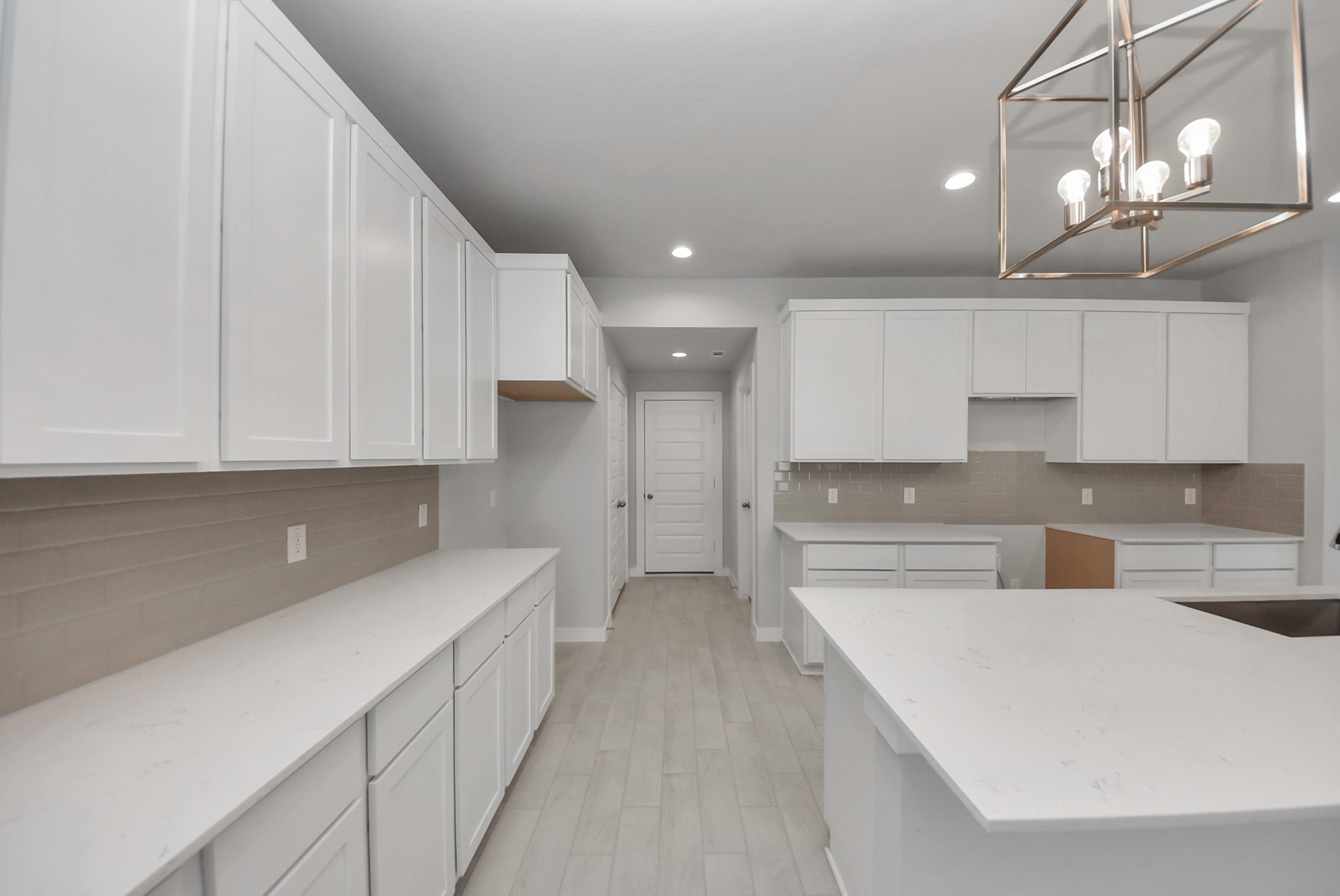 The extended counter area adds both practicality and style, making meal preparation a breeze. Every detail is thoughtfully designed to enhance the kitchen's functionality and aesthetic appeal.
