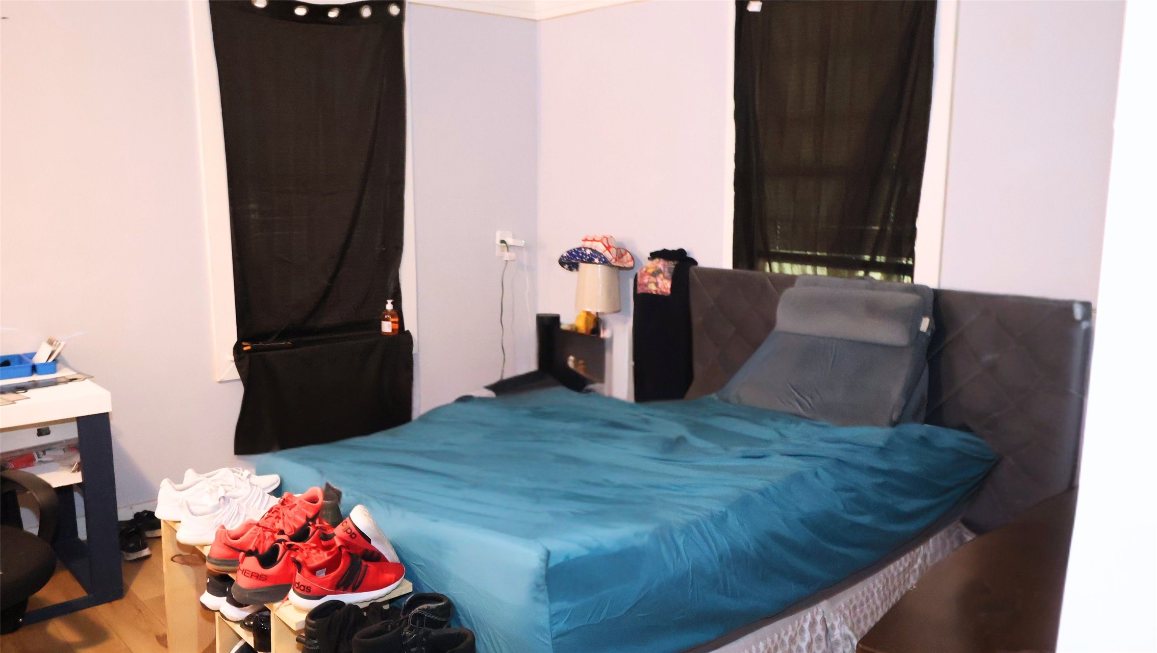 Cozy bedroom large enough for a queen size bed and nightstand. Features ample natural light from two windows. Cozy bedroom large enough for a queen size bed and nightstand. Features ample natural light from two windows.