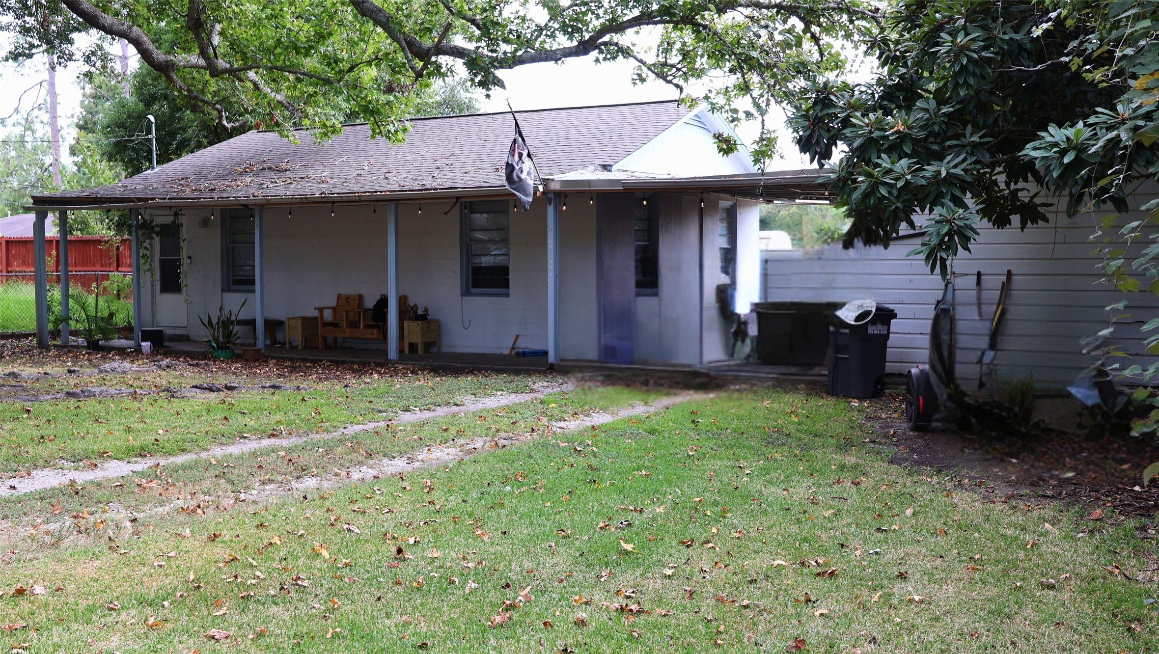 One-car garage next to the house and connected by a breezeway. One-car garage next to the house and connected by a breezeway.