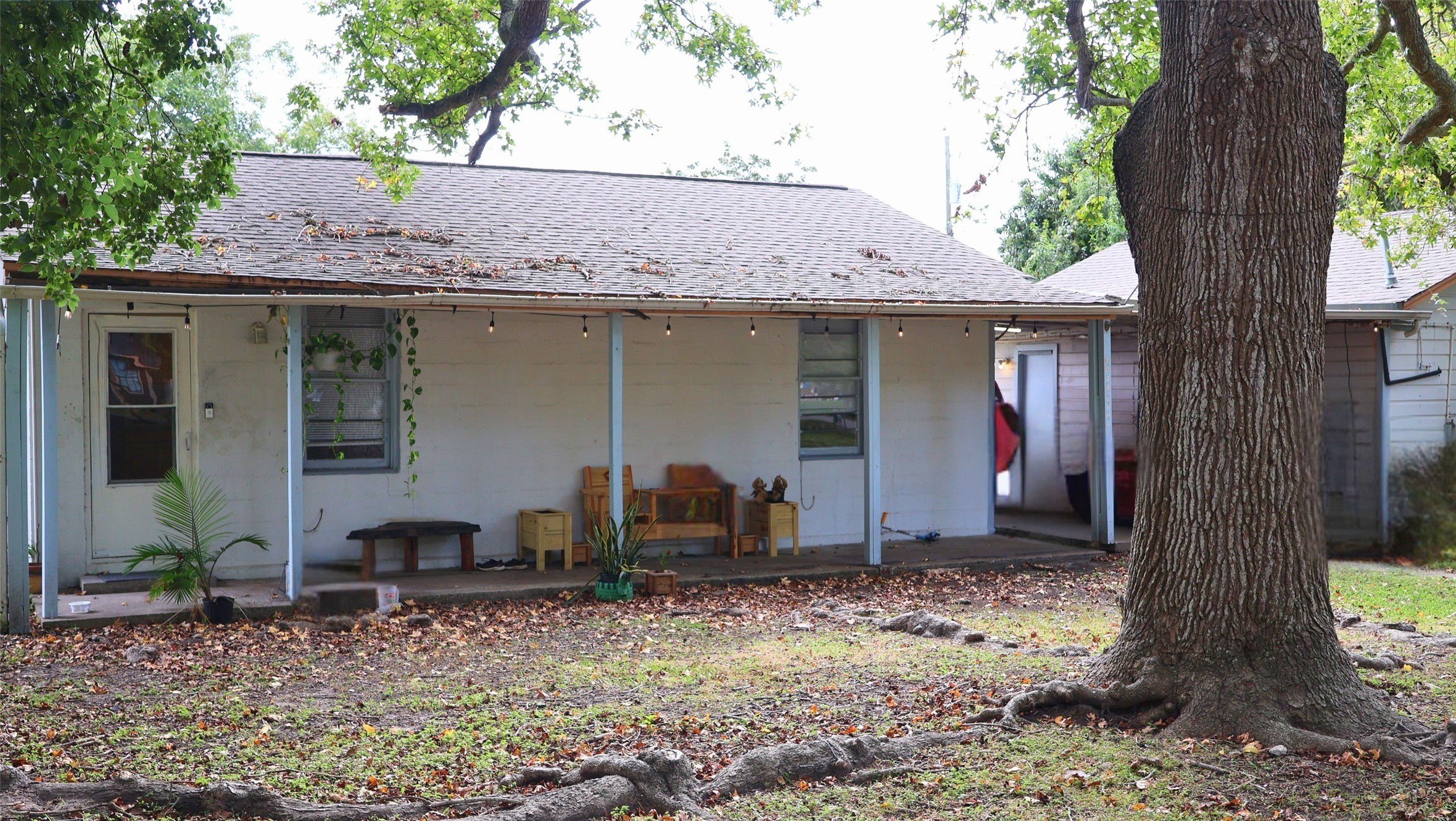 Charming single-story home with a cozy front porch, shaded by mature trees and perfect for relaxation. Charming single-story home with a cozy front porch, shaded by mature trees and perfect for relaxation.