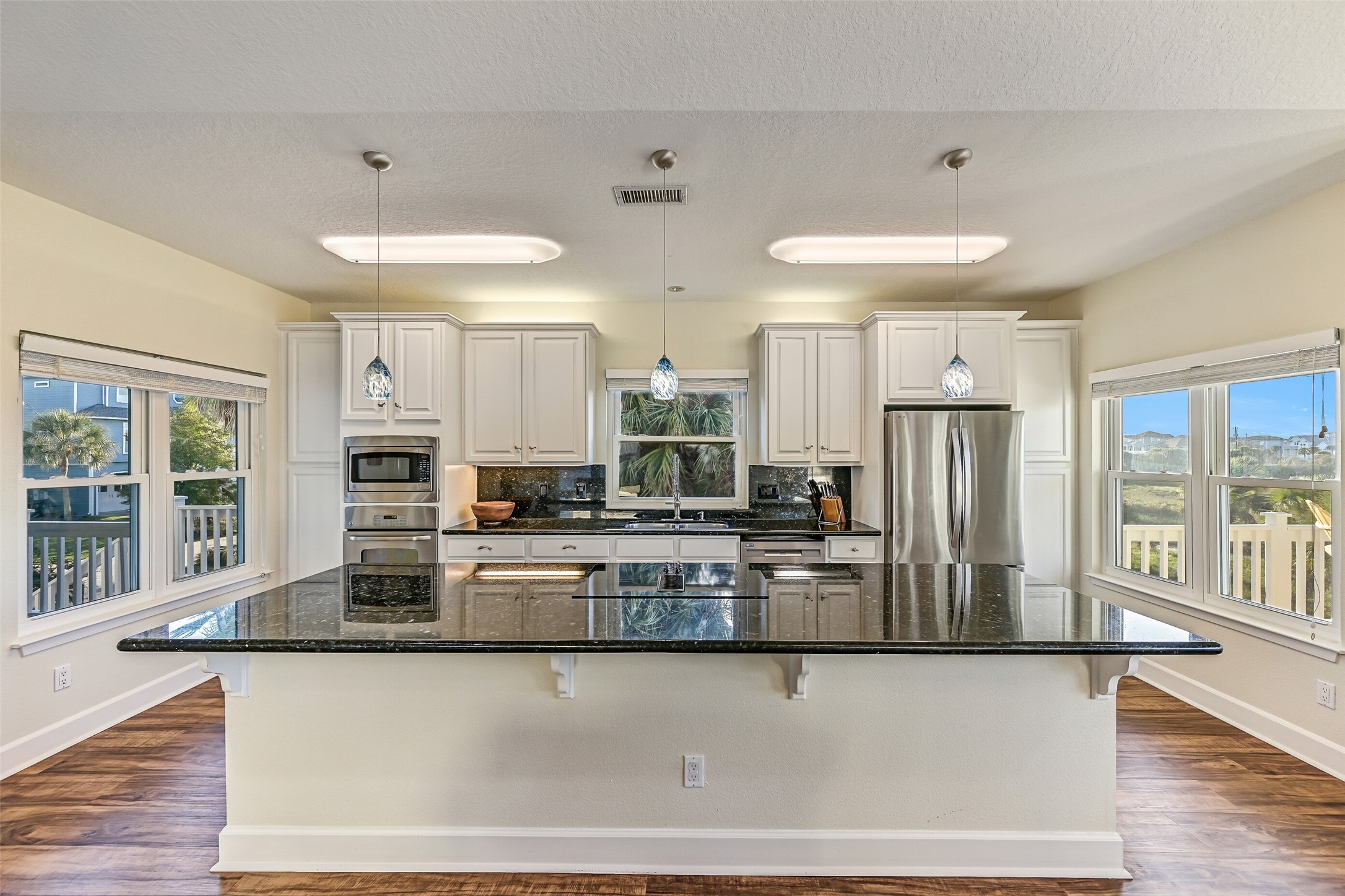 This kitchen has a new microwave and fridge!