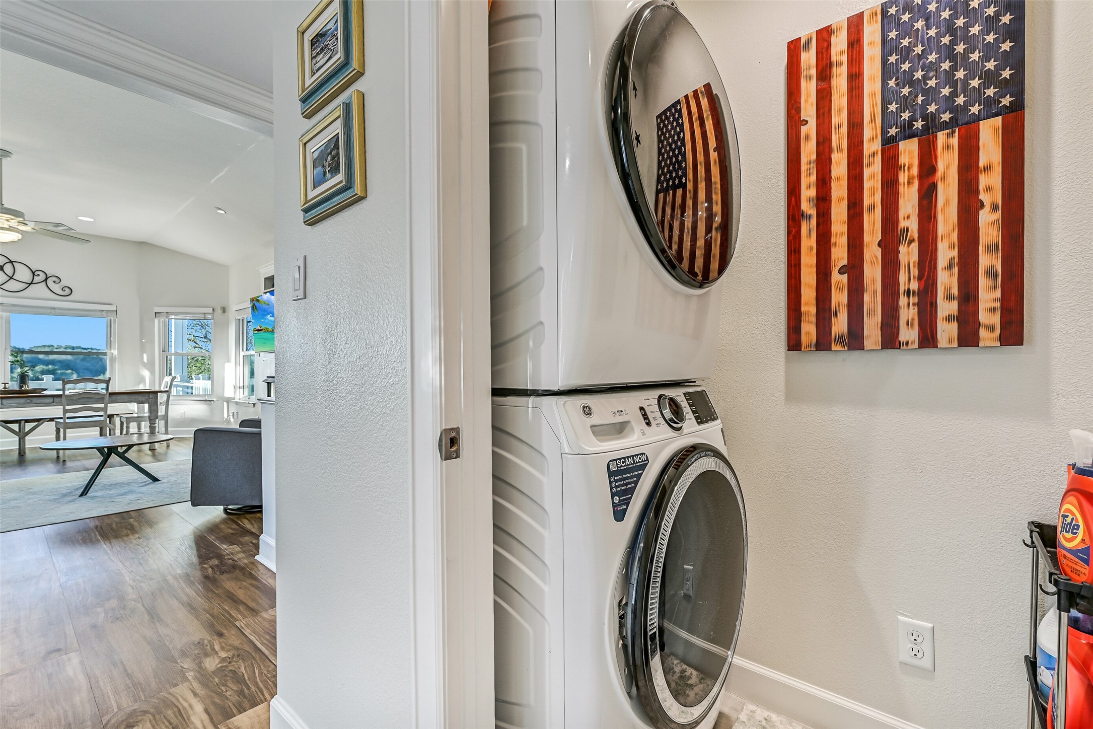 Located off of the entry way is the laundry room with a large washer and dryer.
