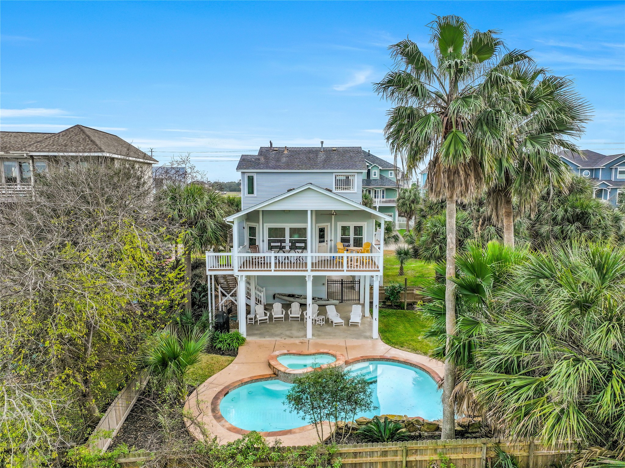 This coastal retreat makes entertaining effortless, featuring a large pool and hot tub, along with multiple south- and west-facing decks perfect for soaking up the sun and sunsets.