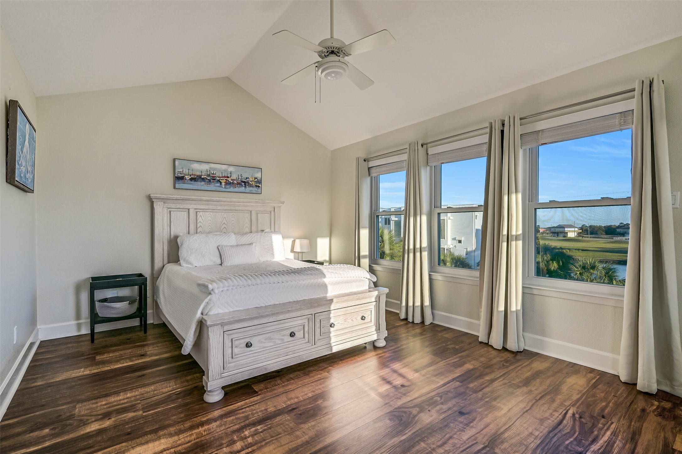 Upon reaching upstairs, youll first find one of the two guest bedrooms this home offers.