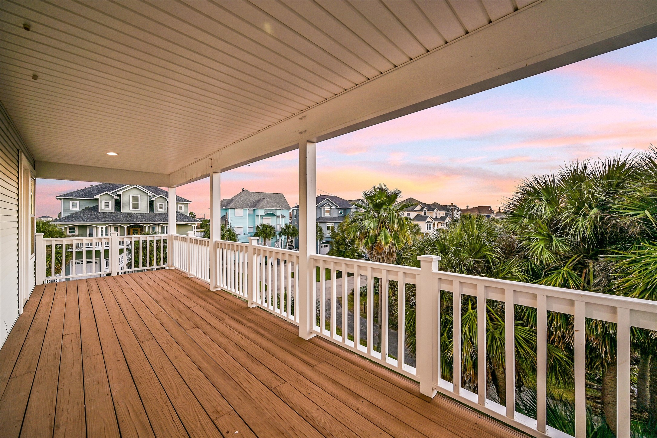 Enjoy sunrise views from the balcony shared by both guest bedrooms.