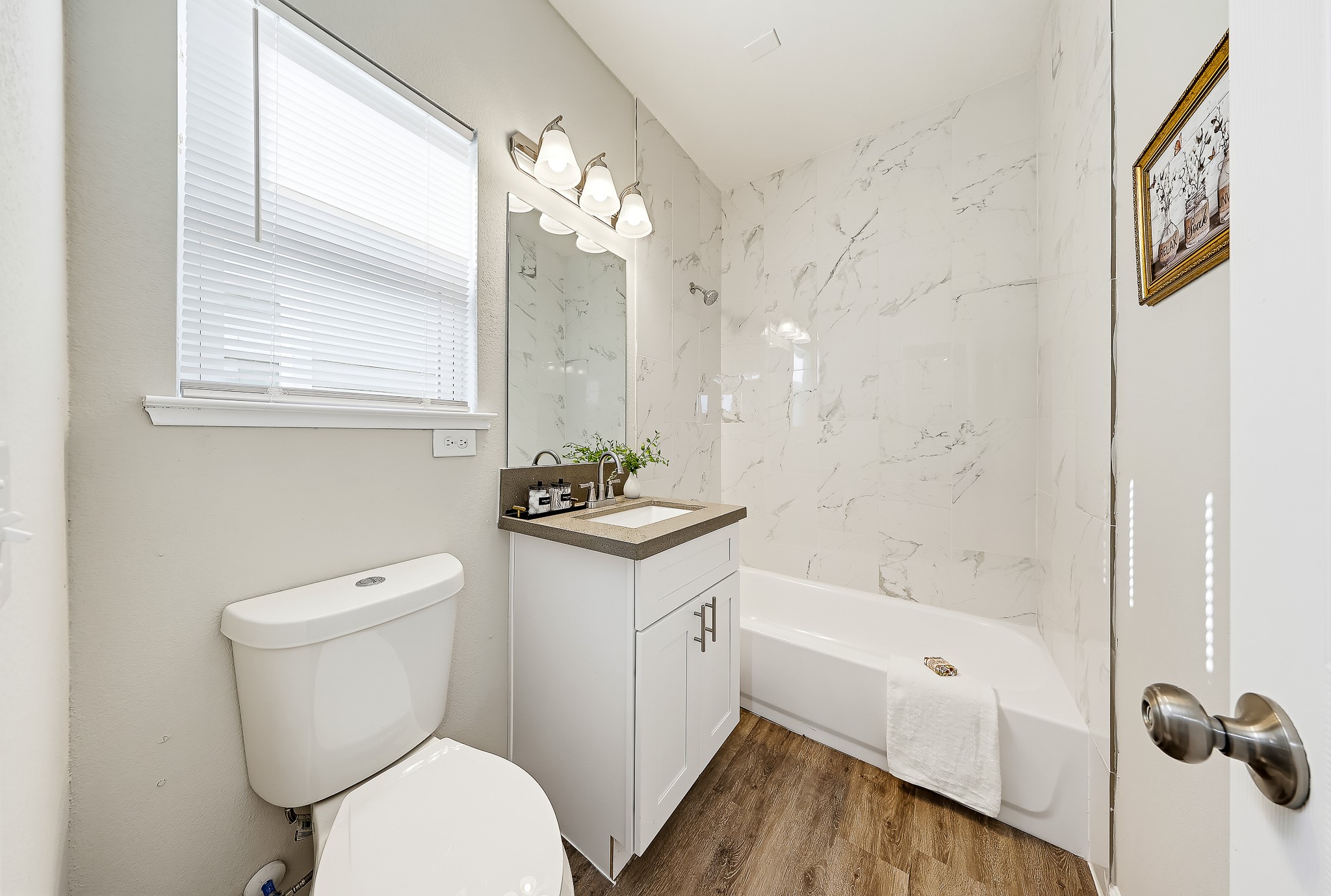 A full upstairs bathroom keeps daily routines convenient for the secondary bedrooms.
