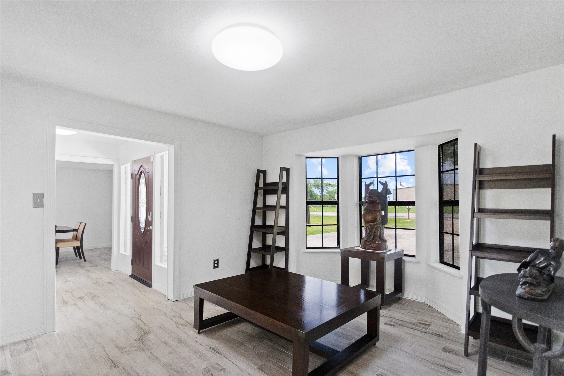 Formal sitting area offering a warm and welcoming atmosphere throughout this home!