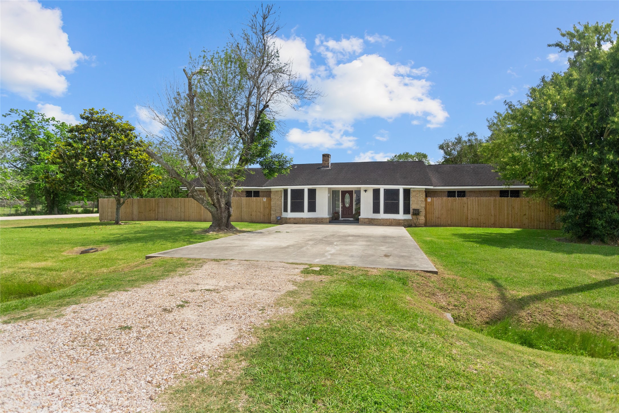 Room for 6 vehicles in the front of the house to park on this large corner lot!