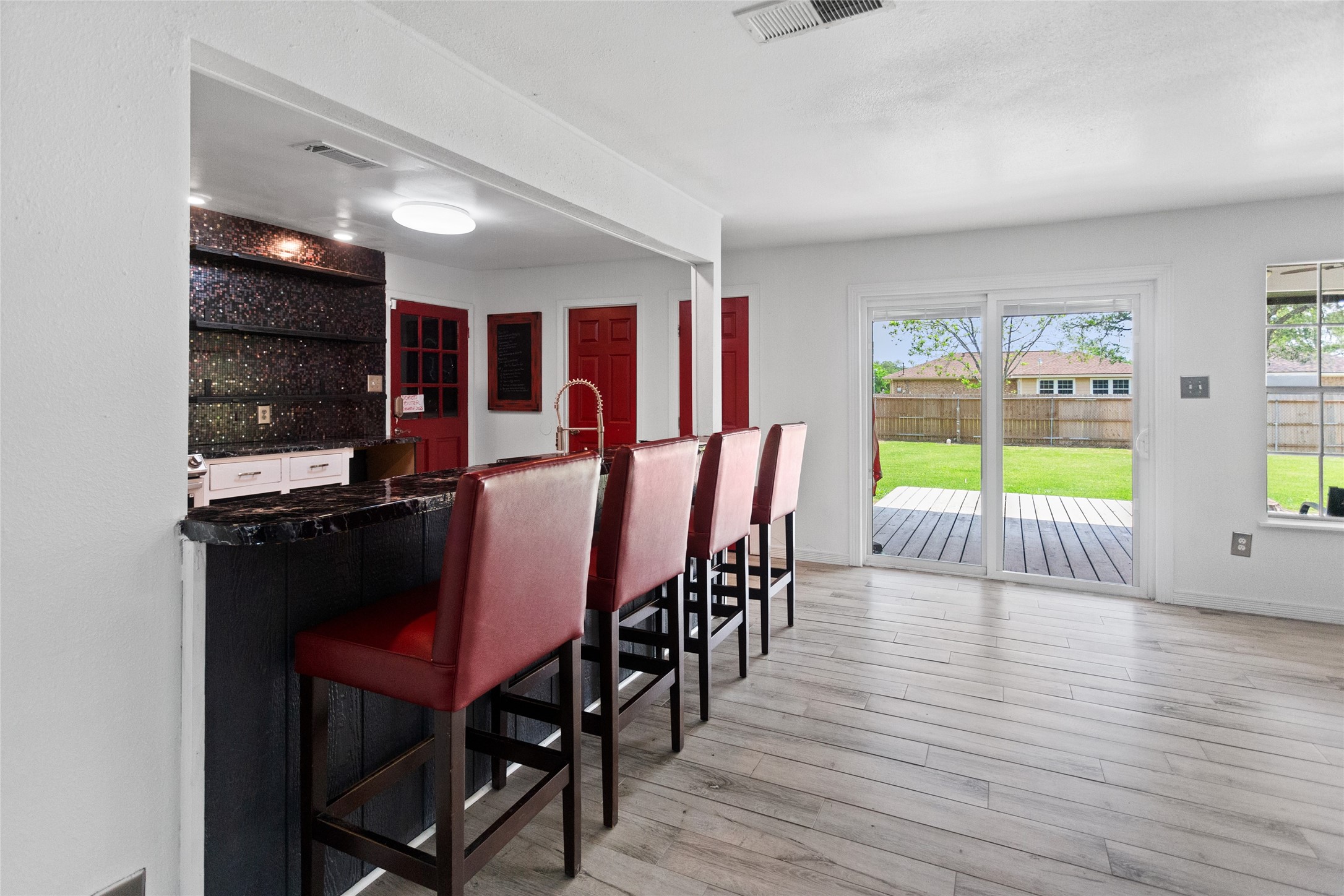 Kitchen breakfast bar open to the family room