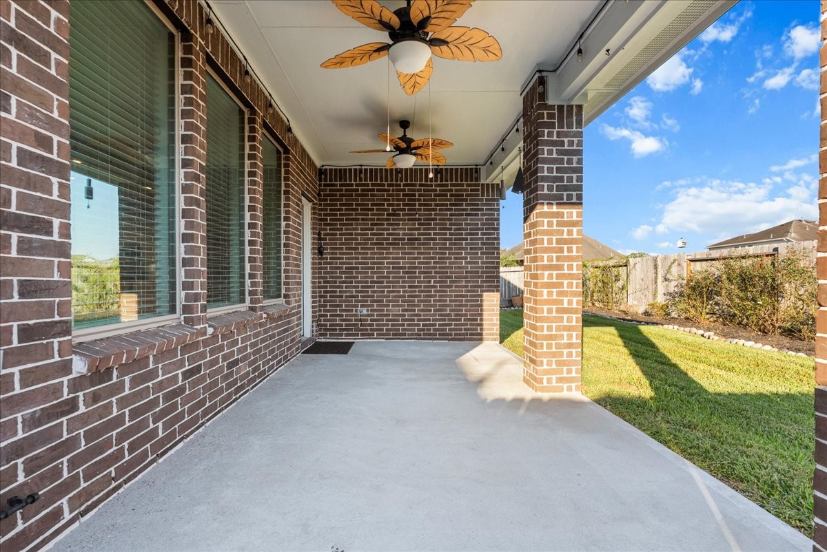 A spacious patio made for weekend gatherings, outdoor dinners, and evenings spent relaxing.
