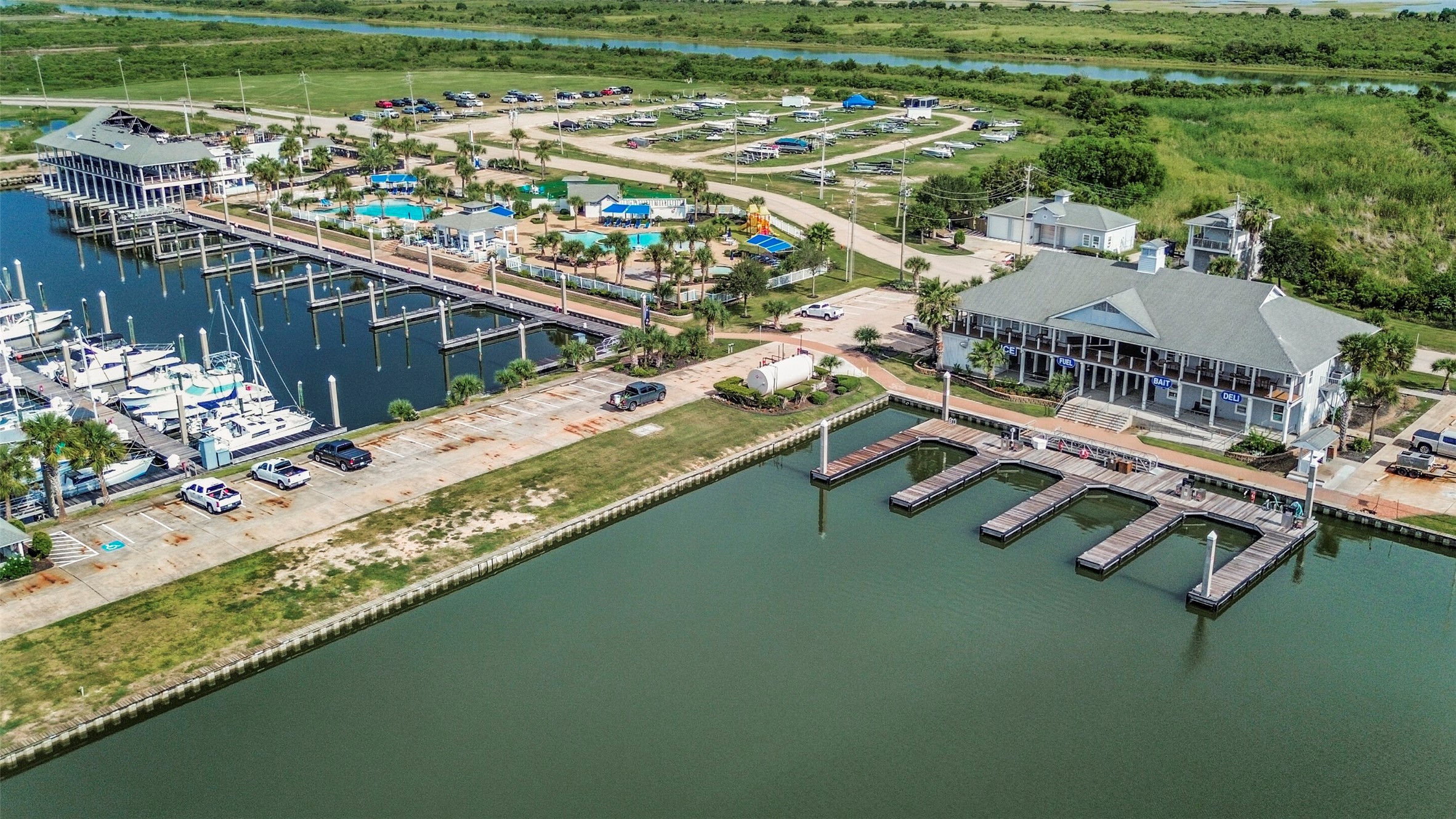Waterfront living takes center stage in HarborWalk. The community offers a private marina, boat ramp, boat dock and boating access for an easy transition from home to open water.
