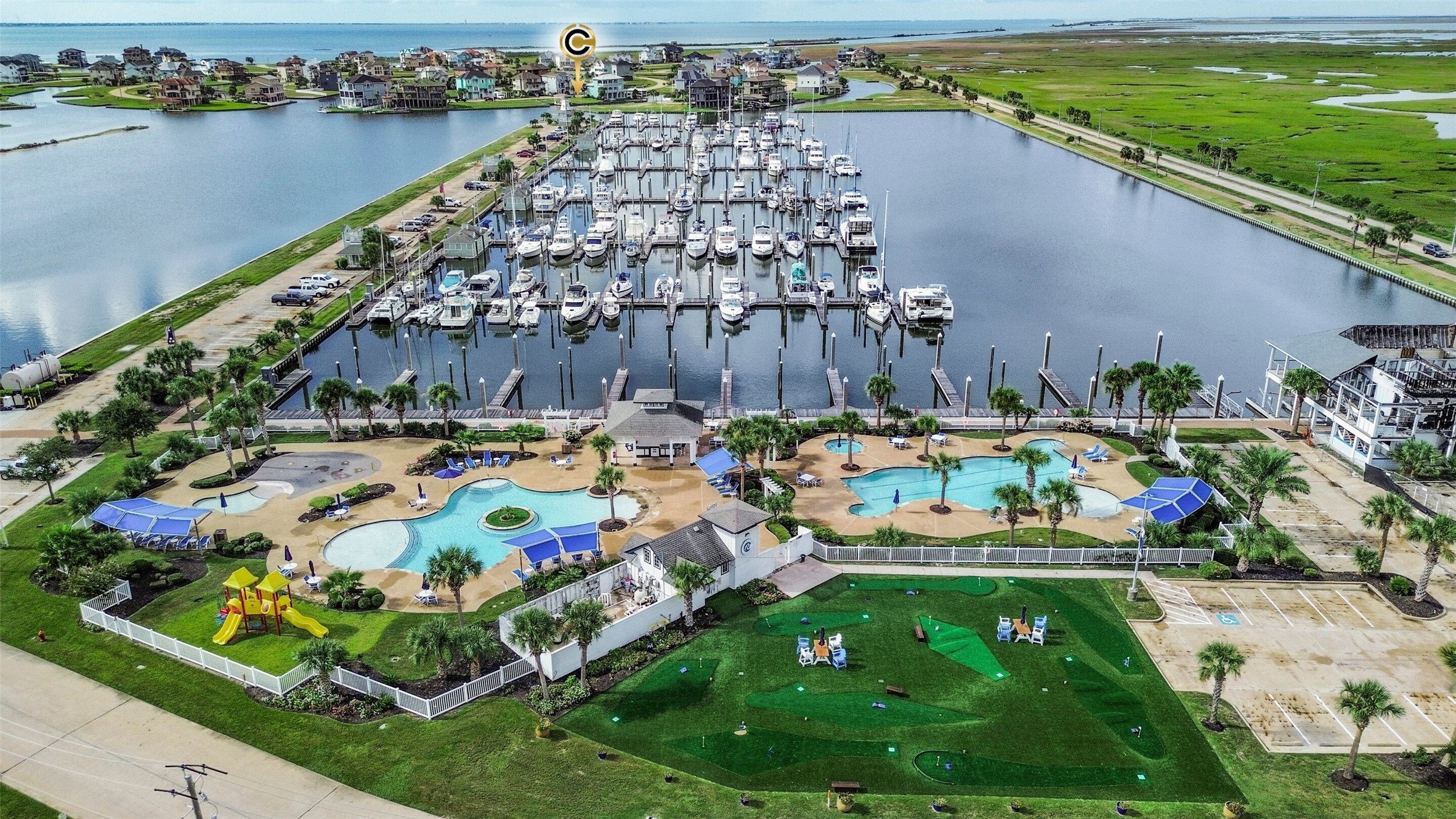 Welcome to HarborWalk, where waterfront living meets resort style amenities on West Galveston Bay. Enjoy access to the marina, yacht club, pools, playground and more within this gated coastal community.