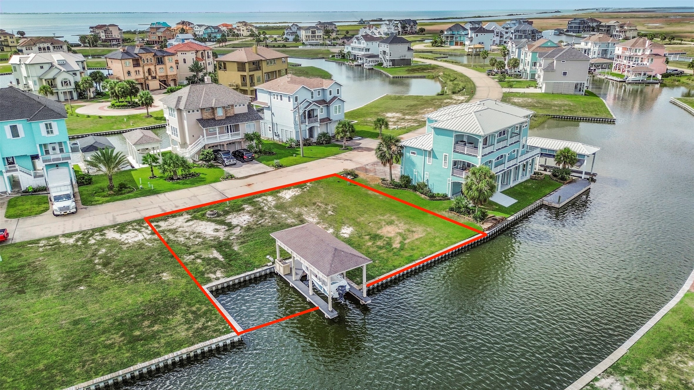 Imagine waking up to water views and stepping outside for a day of fishing or cruising West Galveston Bay. This open waterfront lot gives you the opportunity to design a home around the coastal lifestyle.