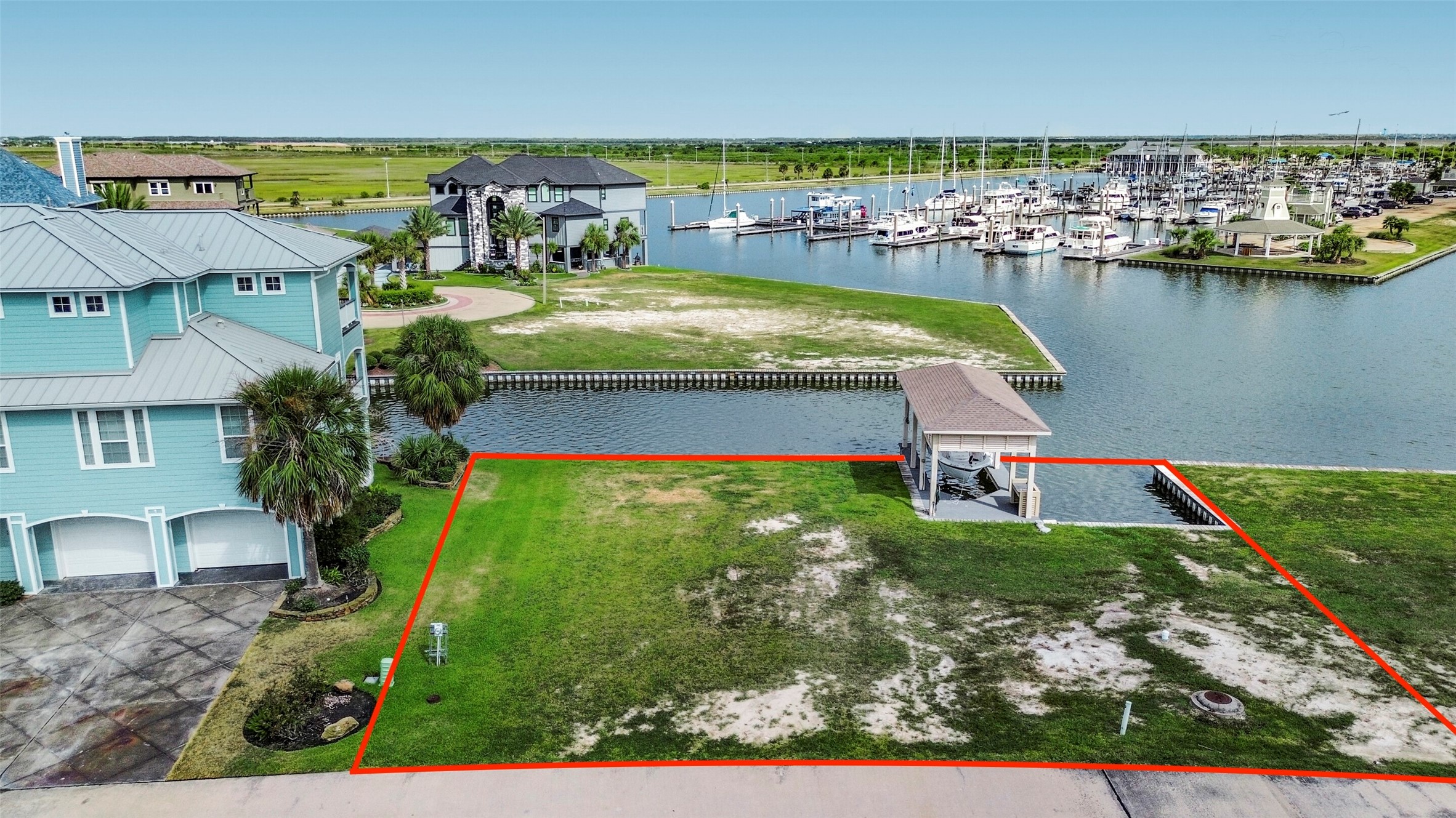 Aerial view showcasing the canal front setting of 22 Fleming and its proximity to HarborWalks extensive waterways. Build your custom coastal home and create the waterfront lifestyle you have been envisioning.