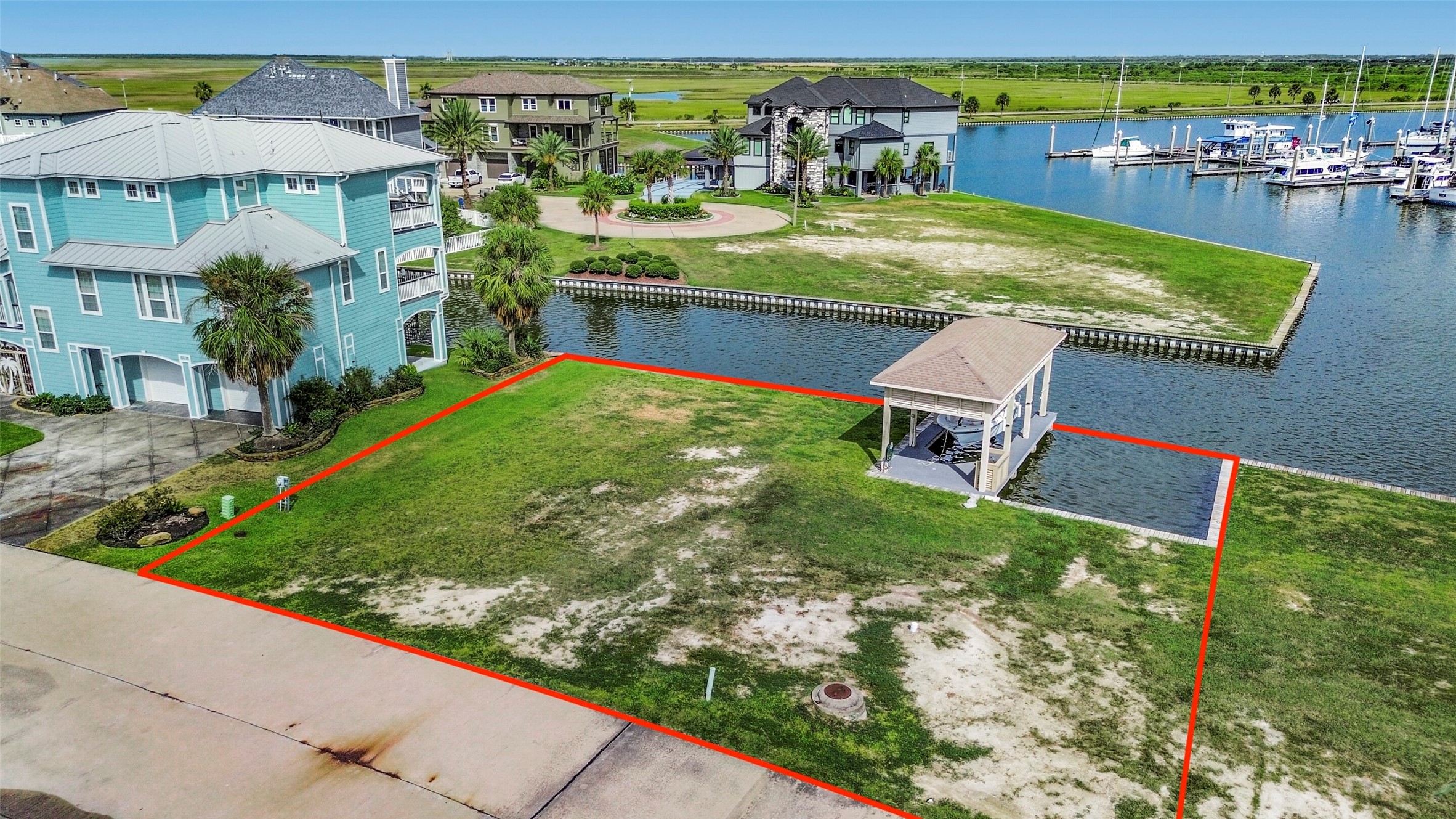This cleared canal front lot offers approximately 6,643 SF with a bulkhead and a fully constructed boatlift already in place. A fantastic head start for creating your custom HarborWalk home.