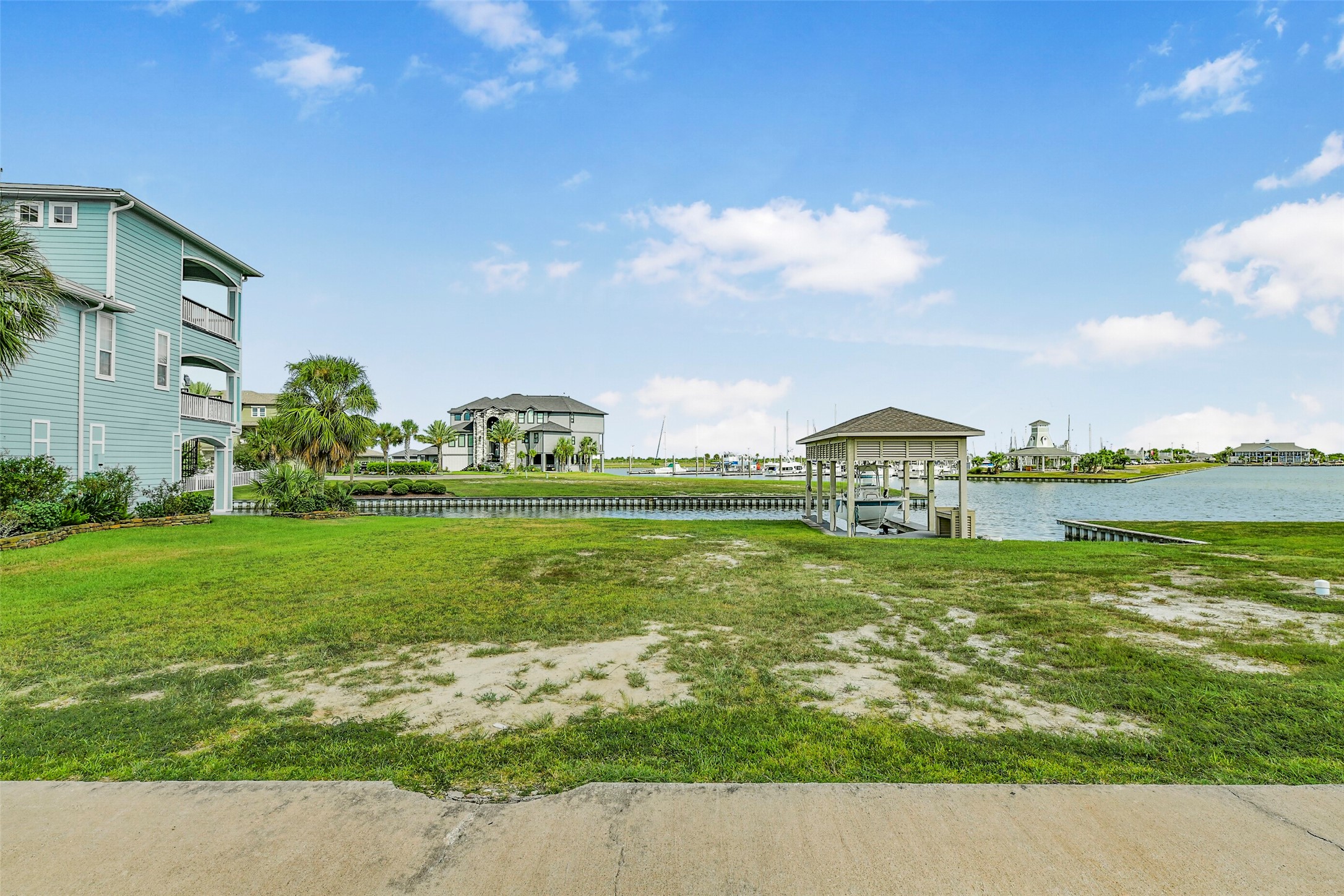 A closer look at the fully constructed boatlift included with the property. Electricity and a fish cleaning station make this setup especially appealing for anglers ready to enjoy the HarborWalk lifestyle.