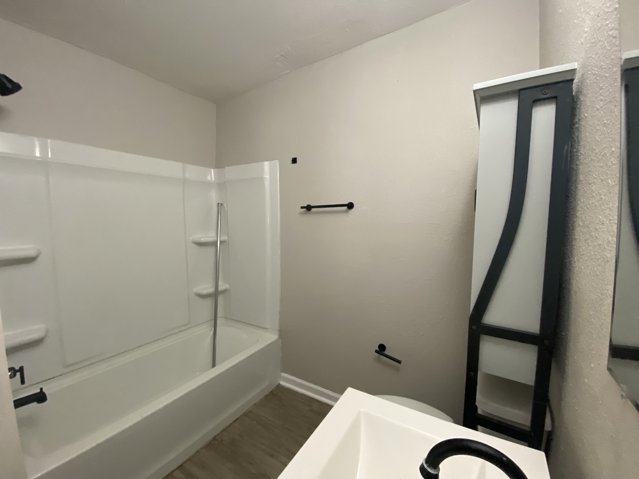 Prior photos; anticipated post-make-ready condition.